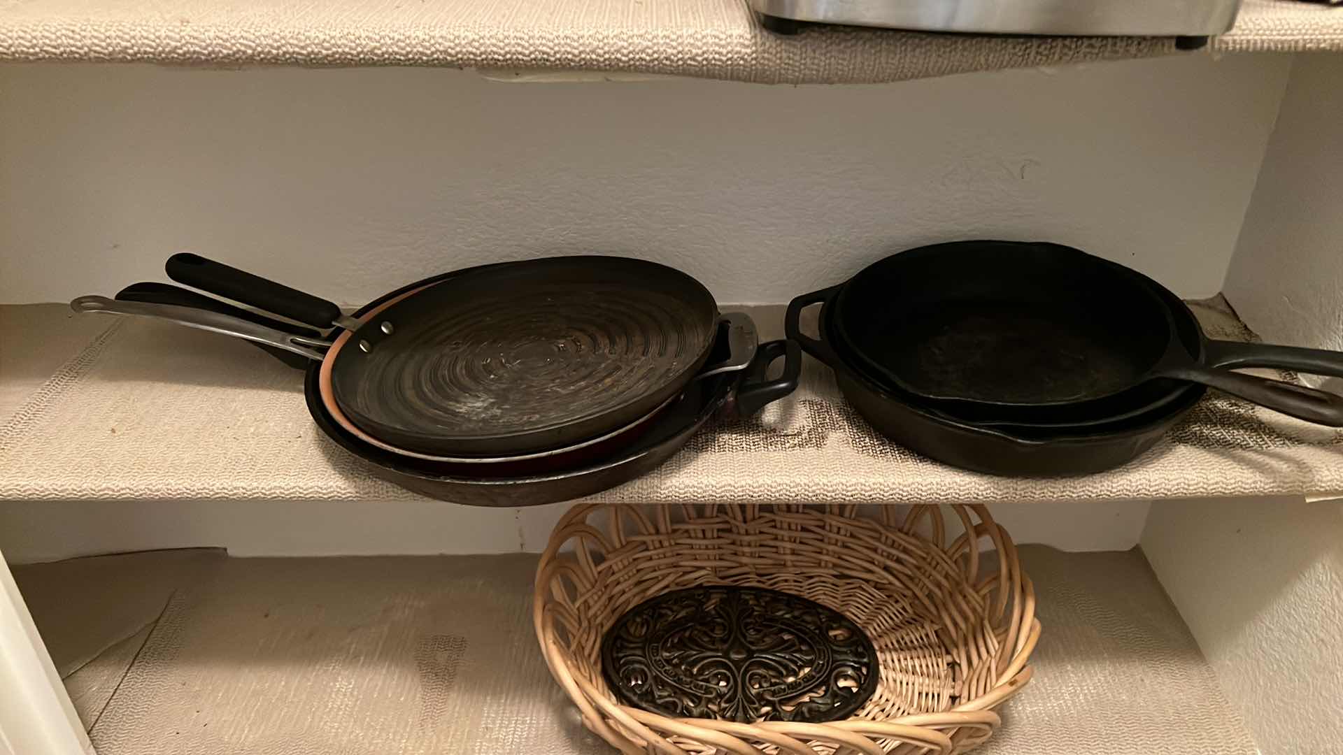 Photo 1 of CONTENTS OF 4 KITCHEN PANTRY SHELVES-CAST IRON SKILLETS, CAN OPENER, FRYER