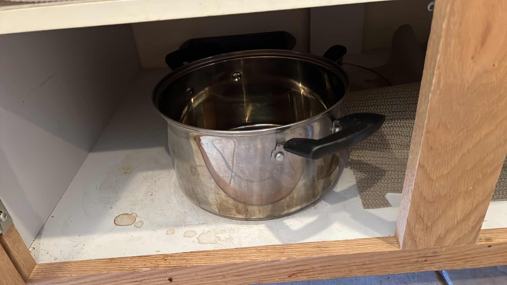 Photo 1 of CONTENTS OF KITCHEN CABINET-POTS & PANS