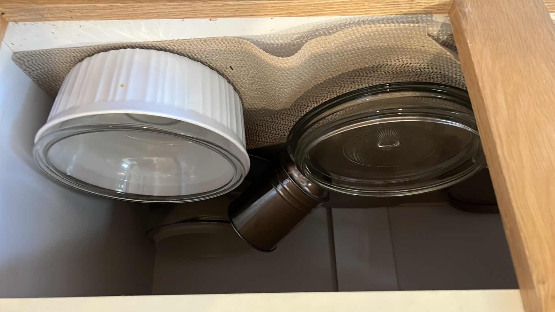 Photo 1 of CONTENTS OF KITCHEN CABINET- BAKEWARE