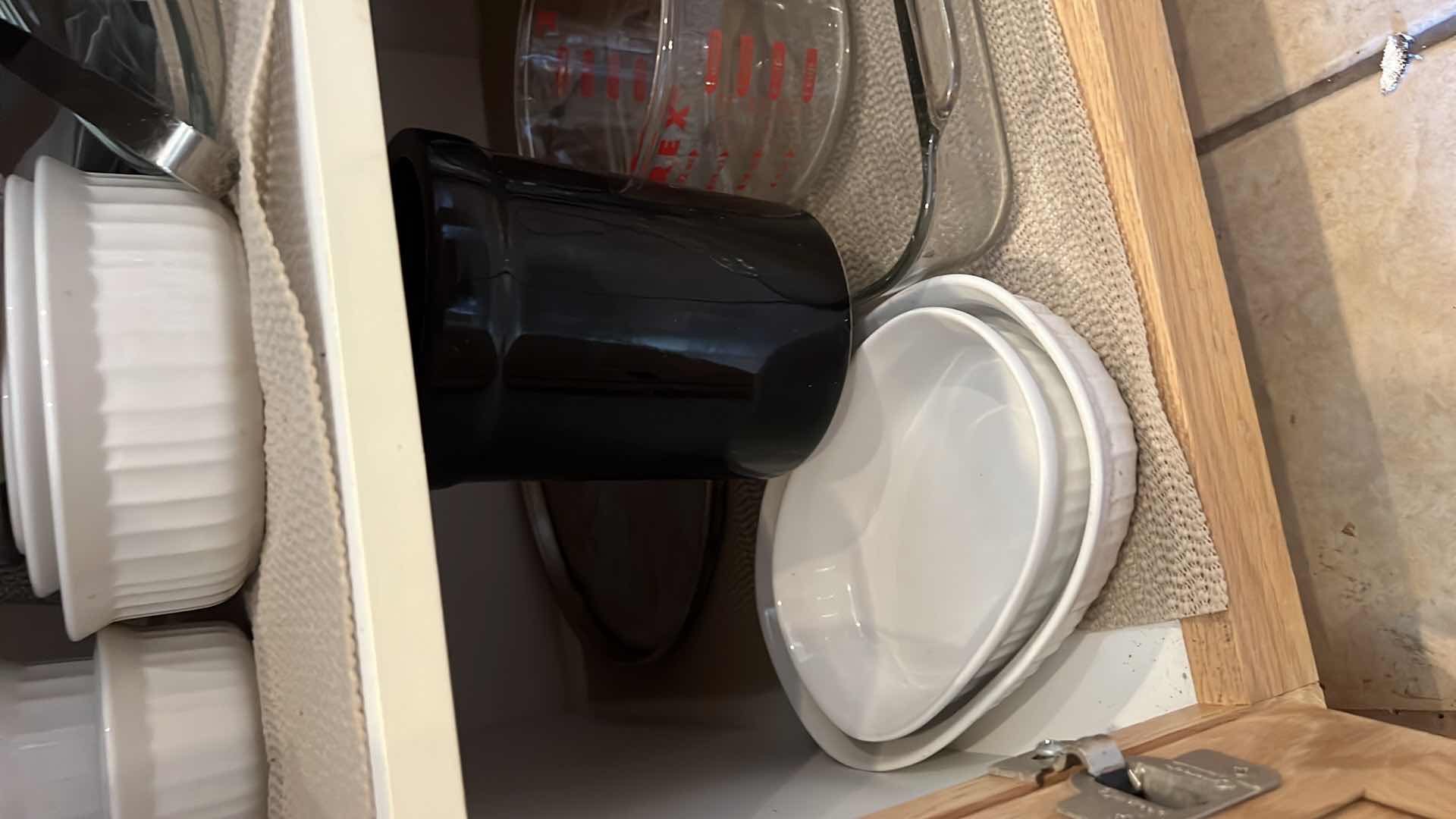 Photo 1 of CONTENTS OF KITCHEN CABINET- BAKEWARE