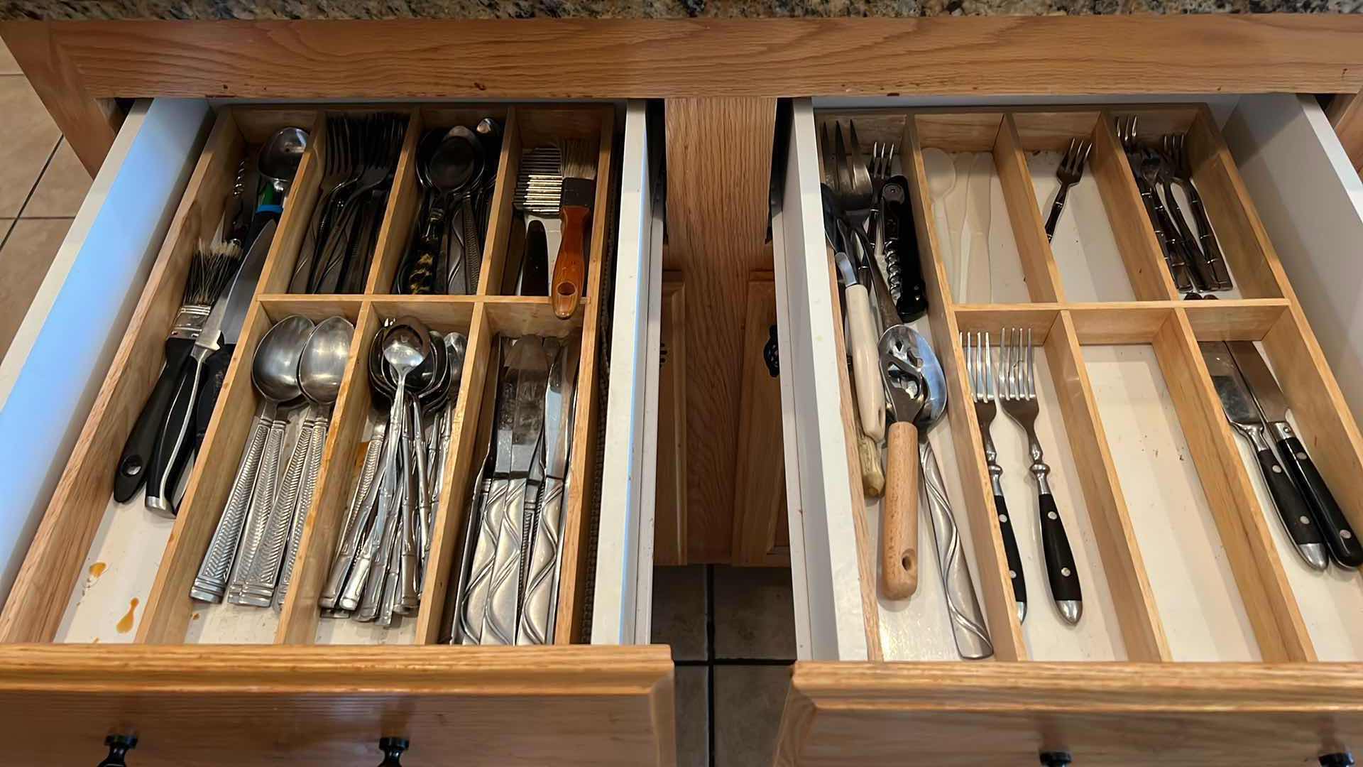 Photo 1 of CONTENTS OF 2-KITCHEN DRAWERS-FLATWARE & KNIVES