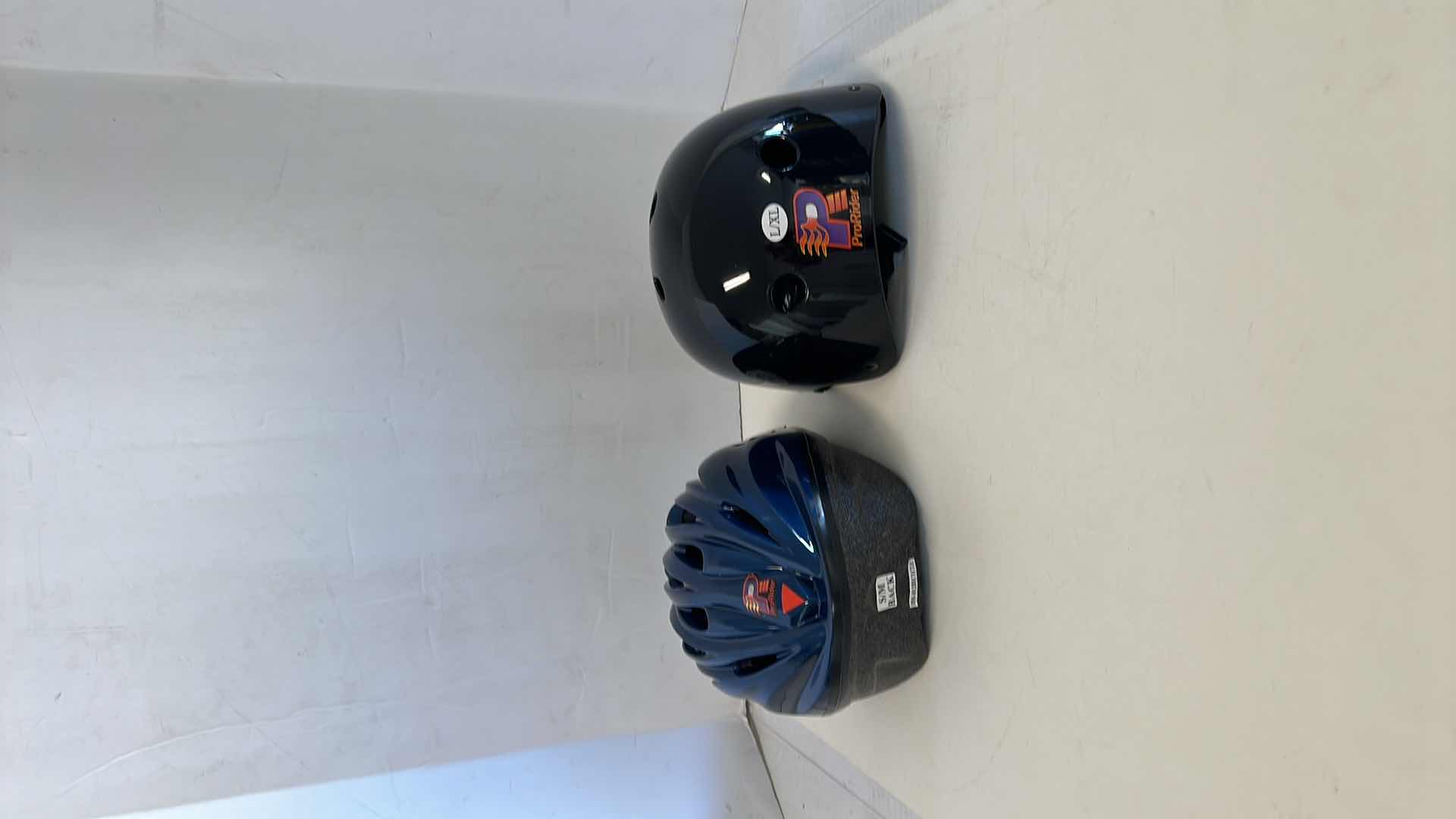 Photo 1 of 2 NEW IN BAG BIKE HELMETS,S/M AND L/XL