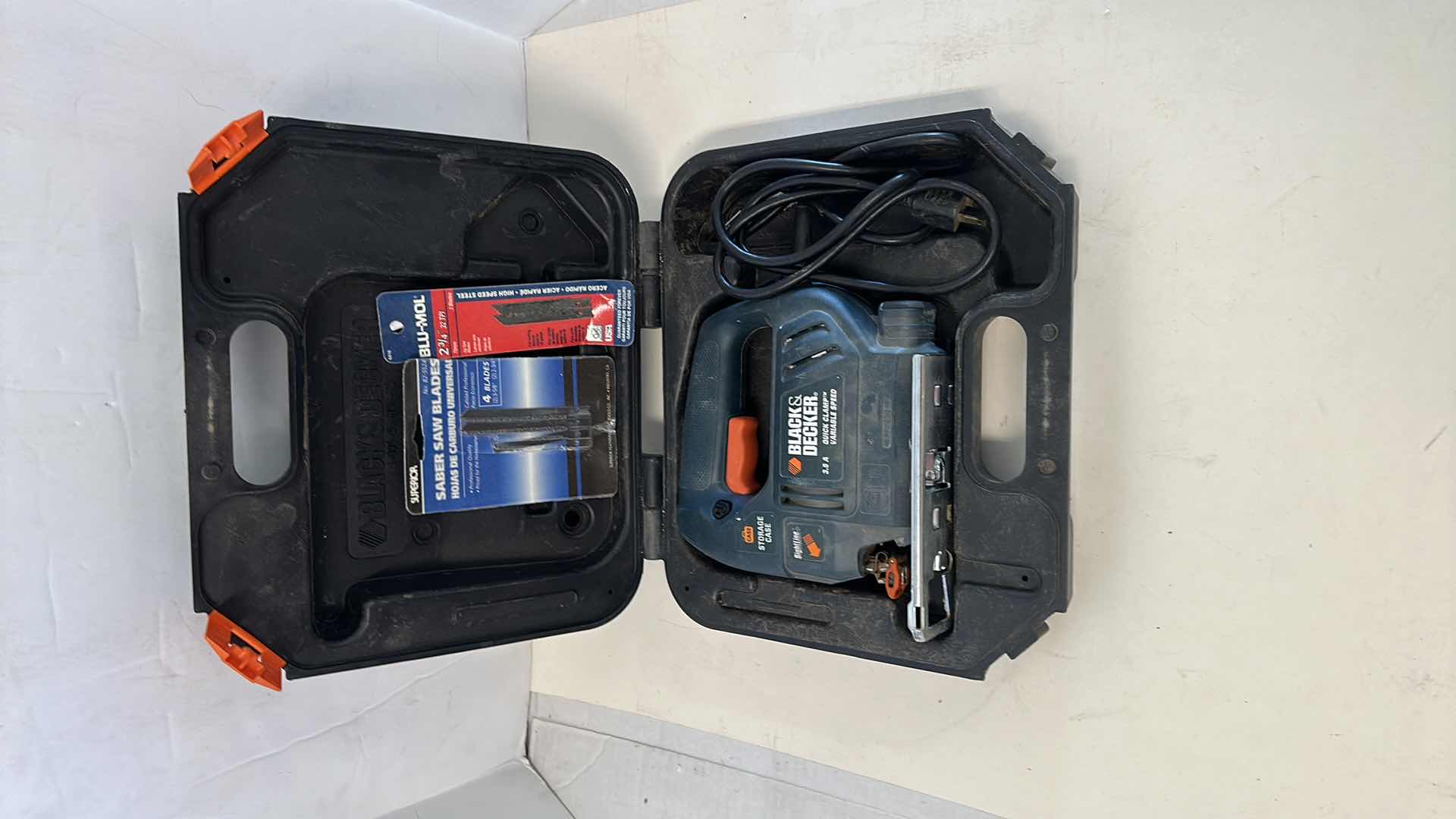 Photo 1 of BLACK AND DECKER SKILL SAW AND BLADES