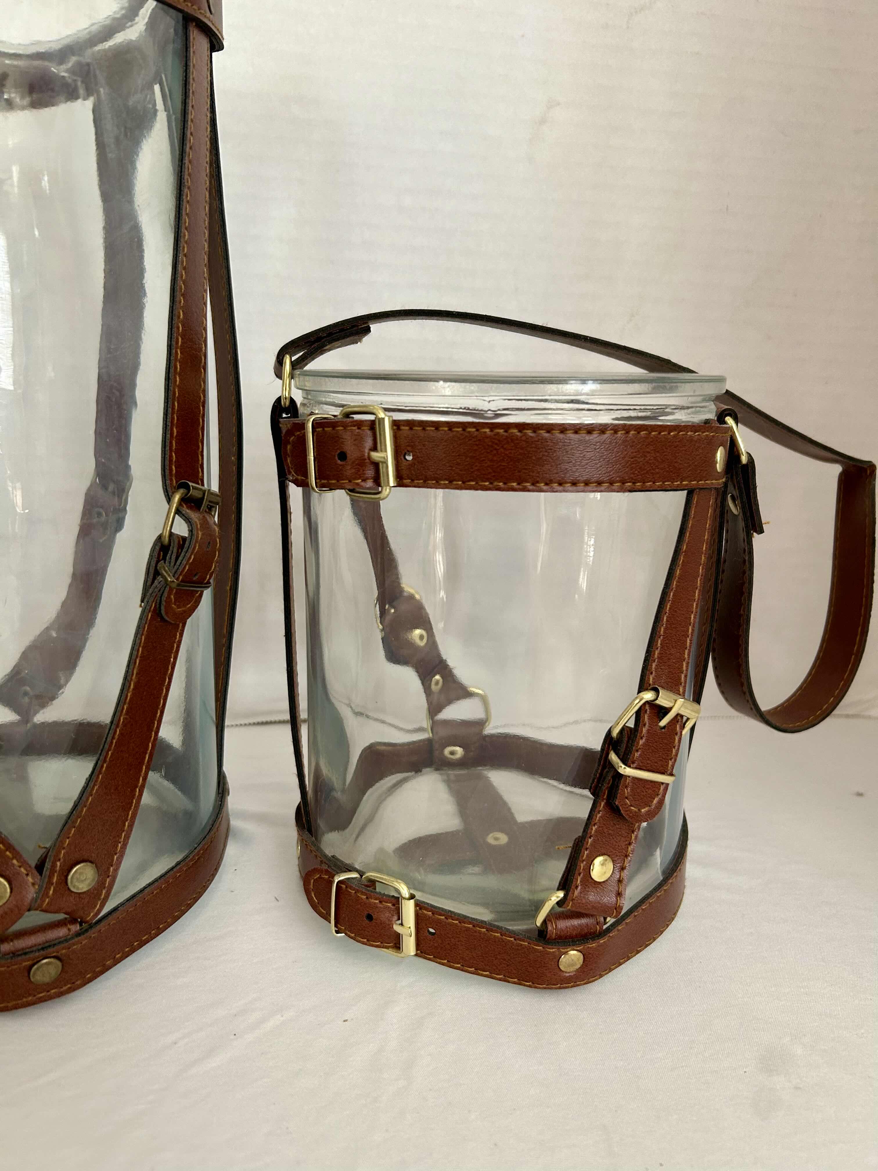 Photo 1 of 2 HANGING LEATHER WRAPPED HURRICANE THICK GLASS CANDLE HOLDERS H12” and H7”