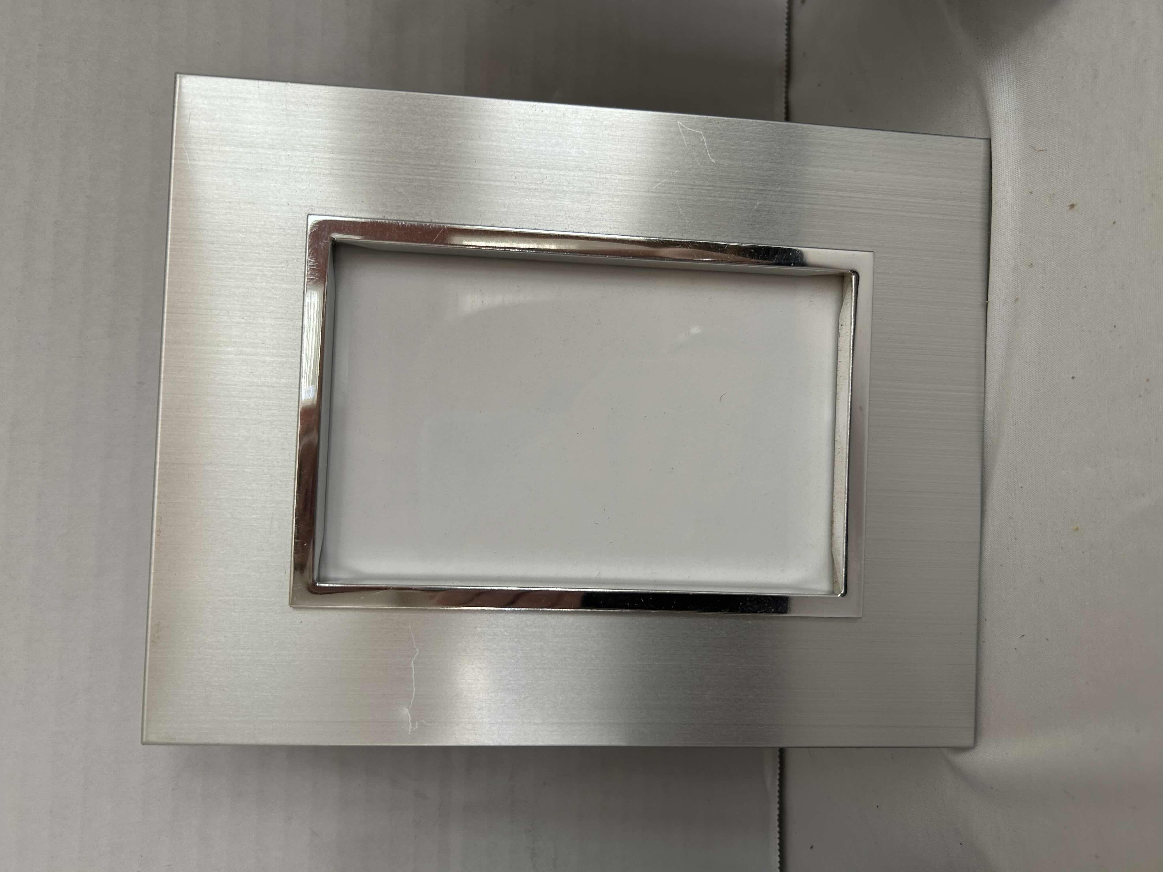 Photo 1 of 3 5”X7” FRAMES. 2 BLACK, 1 SILVER