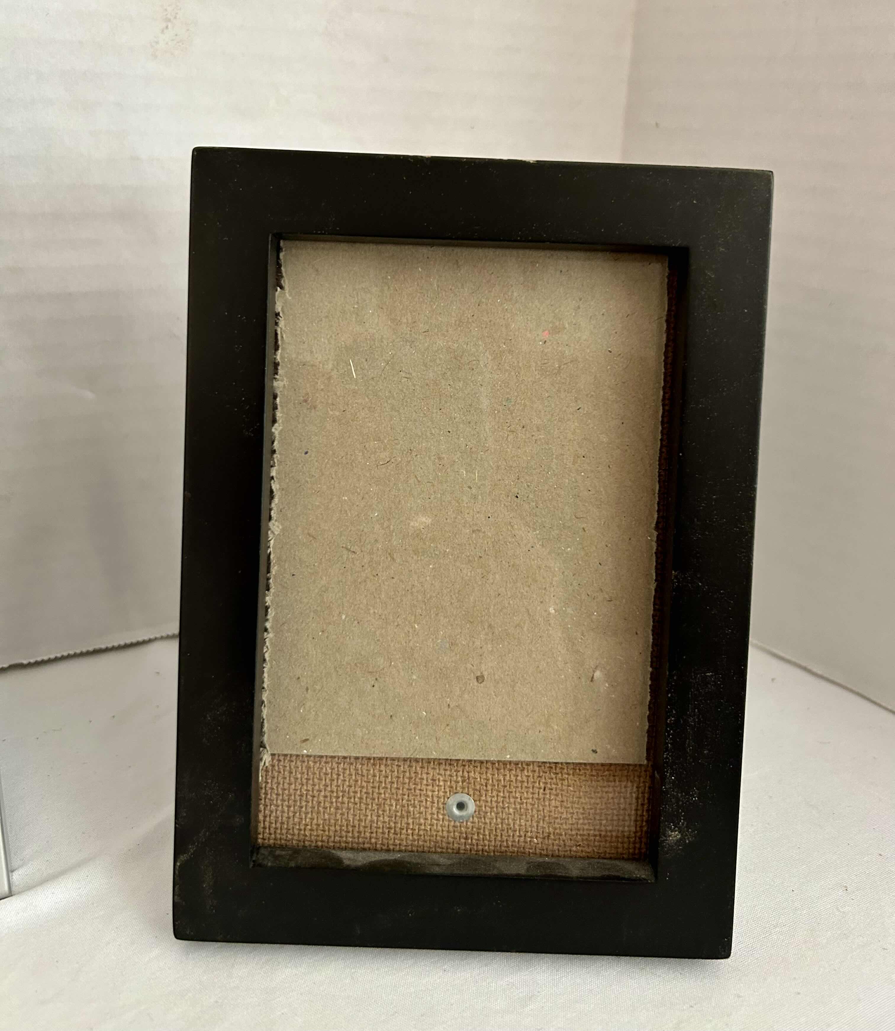 Photo 1 of 3 5”X7” FRAMES. 2 BLACK, 1 SILVER