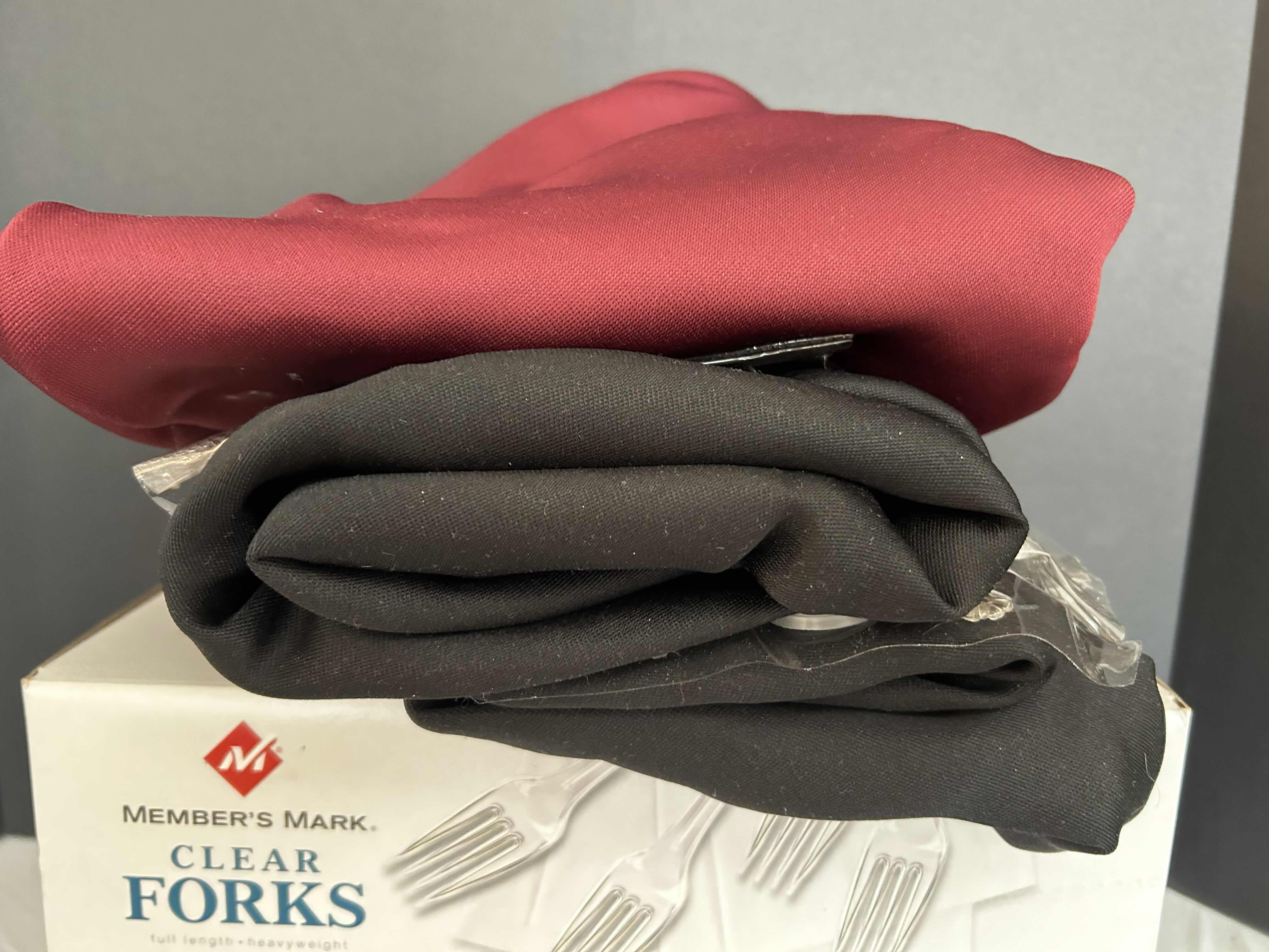 Photo 1 of 3 CIRCULAR TABLE CLOTHES IN BLACK (2) AND MAROON (1) and BOX of PLASTIC FORKS

$40.00