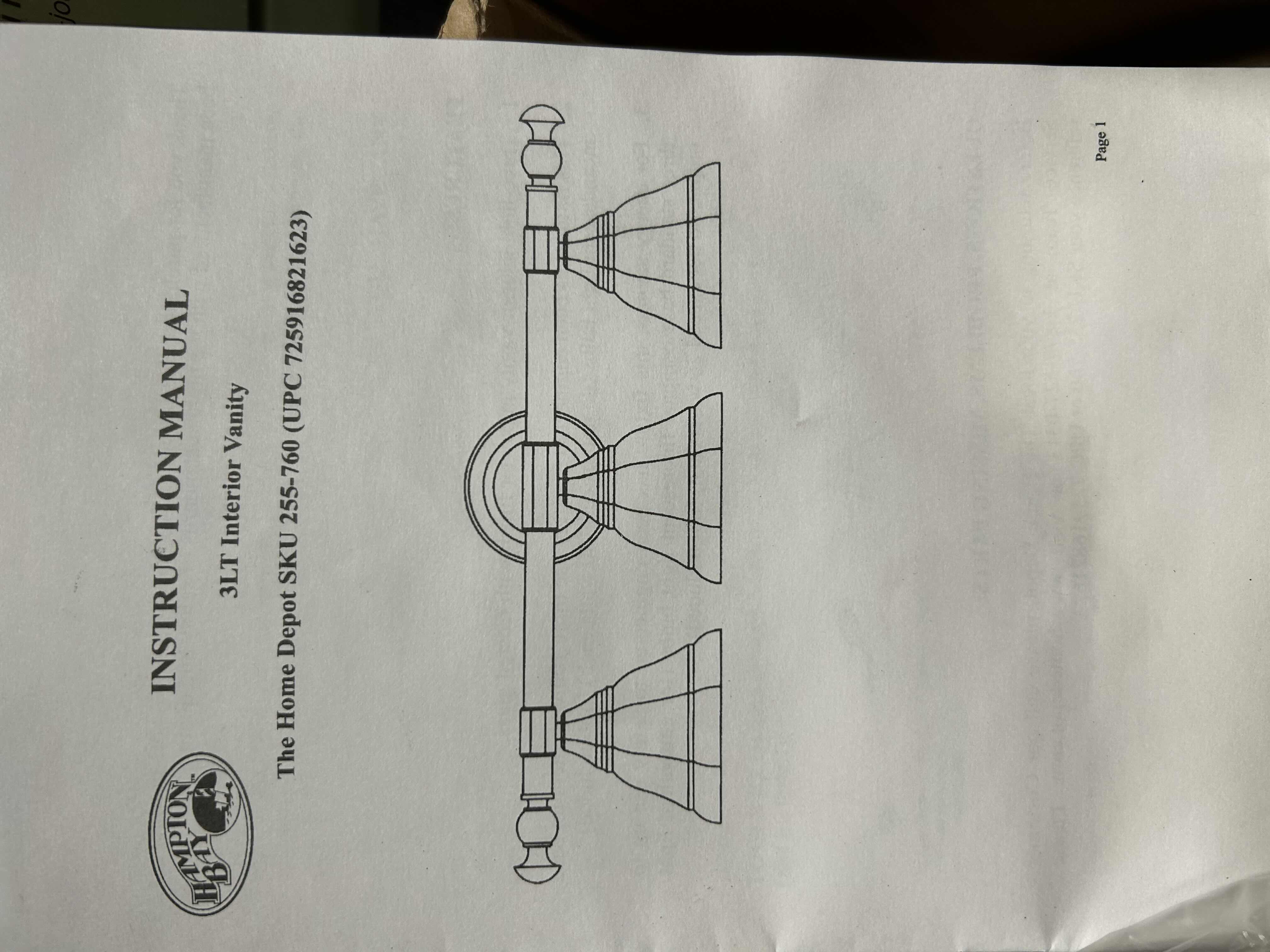 Photo 1 of HAMPTON BAY VANITY 3 LIGHT FIXTURE WITH PEWTER FINISH AND FROSTED GLASS SHADES .
26” X 7” H 9.25”