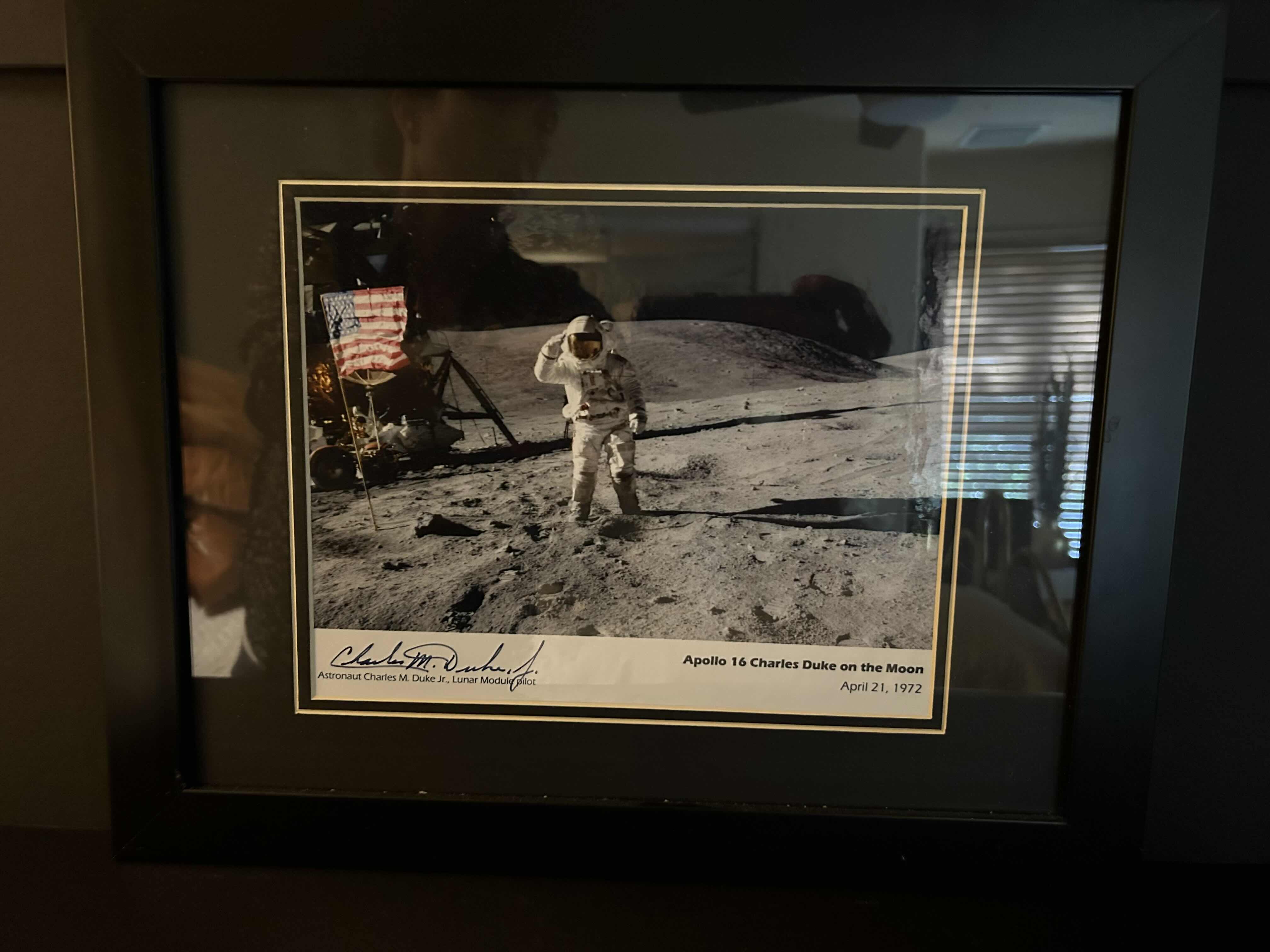 Photo 1 of APOLLO 16 FRAMED PHOTOGRAPH SIGNED BY ASTRONAUT CHARLIE DUKE WITH CERTIFICATE OF AUTHENTICITY IN BLACK FRAME 16” X 13” 

300.00