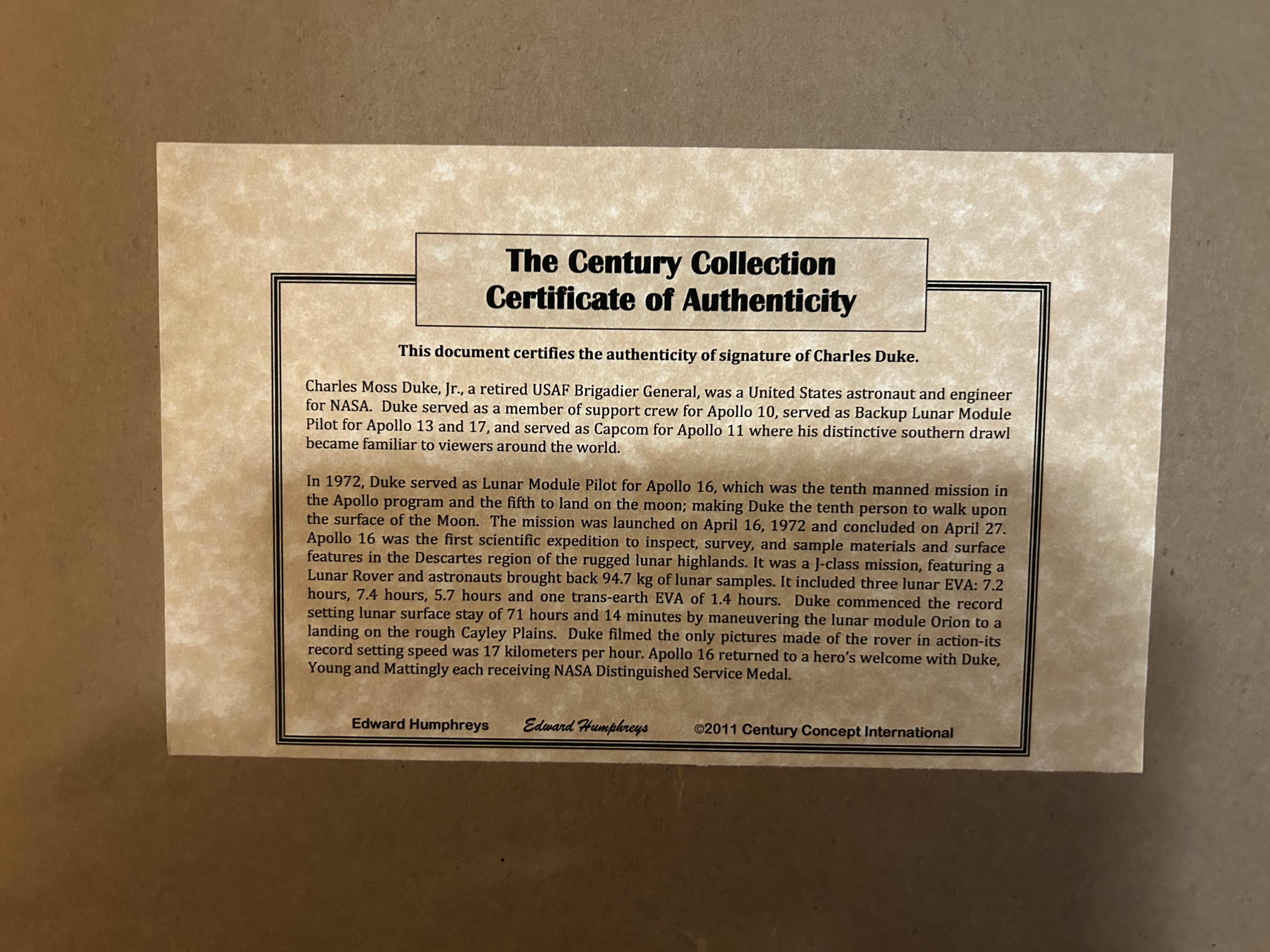 Photo 1 of APOLLO 16 FRAMED PHOTOGRAPH SIGNED BY ASTRONAUT CHARLIE DUKE WITH CERTIFICATE OF AUTHENTICITY IN BLACK FRAME 16” X 13” 

300.00