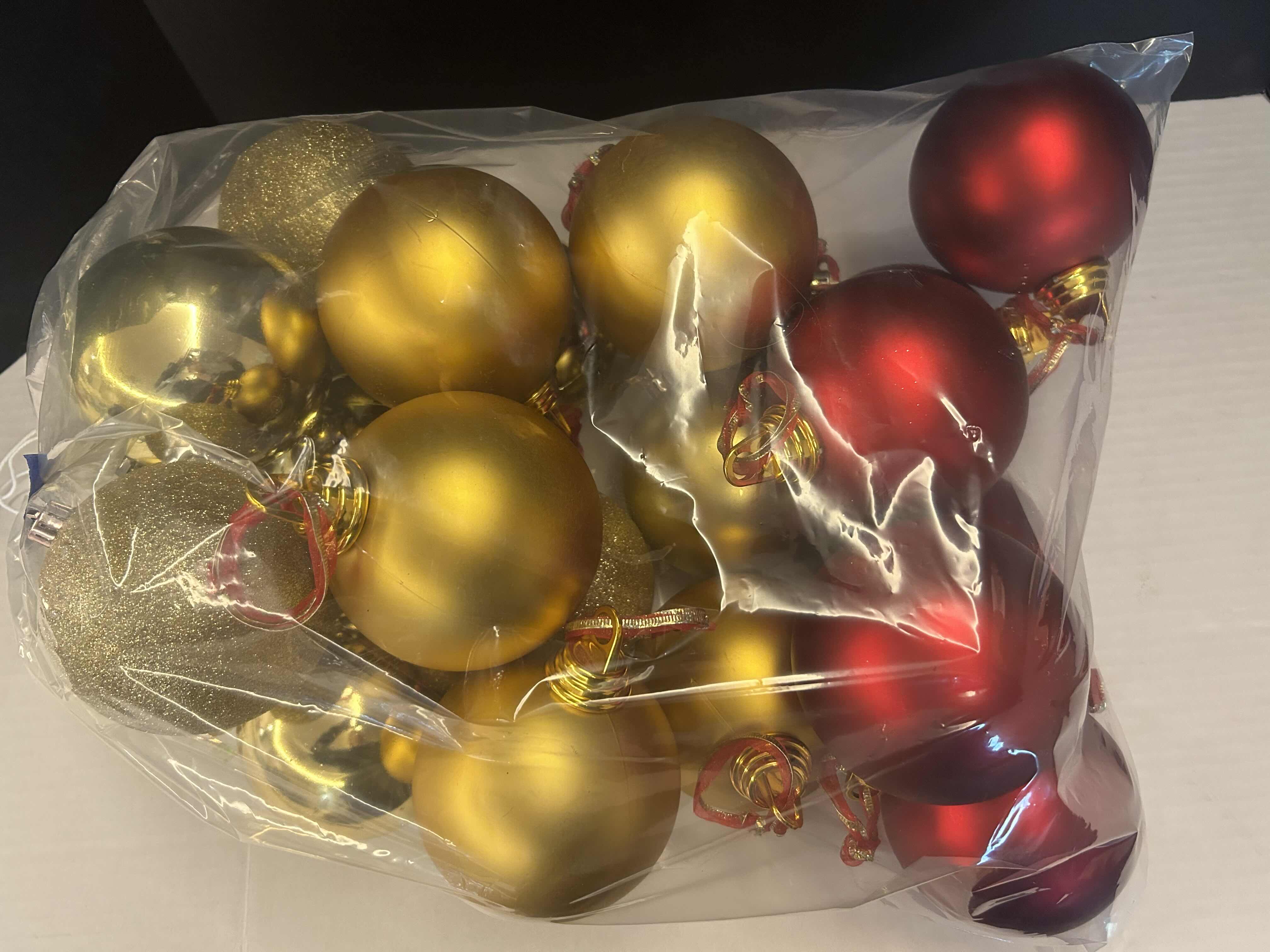 Photo 1 of BAG OF OVERSIZED CHRISTMAS ORNAMENTS
