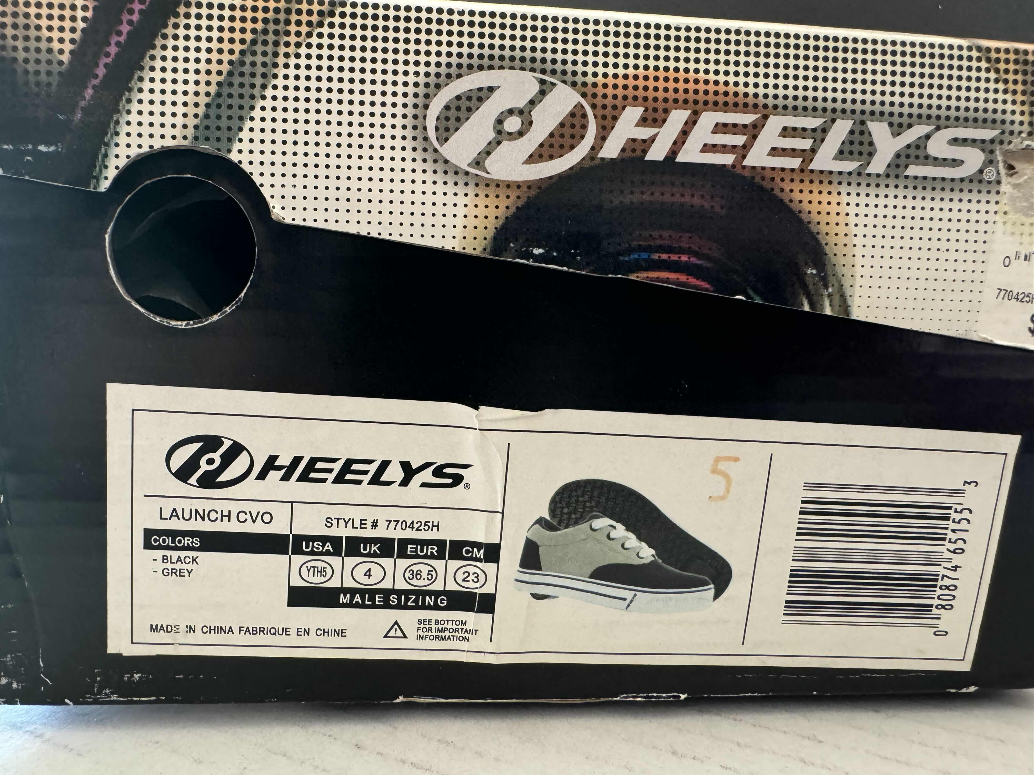 Photo 1 of BRAND NEW HEELYS SIZE YOUTH 5