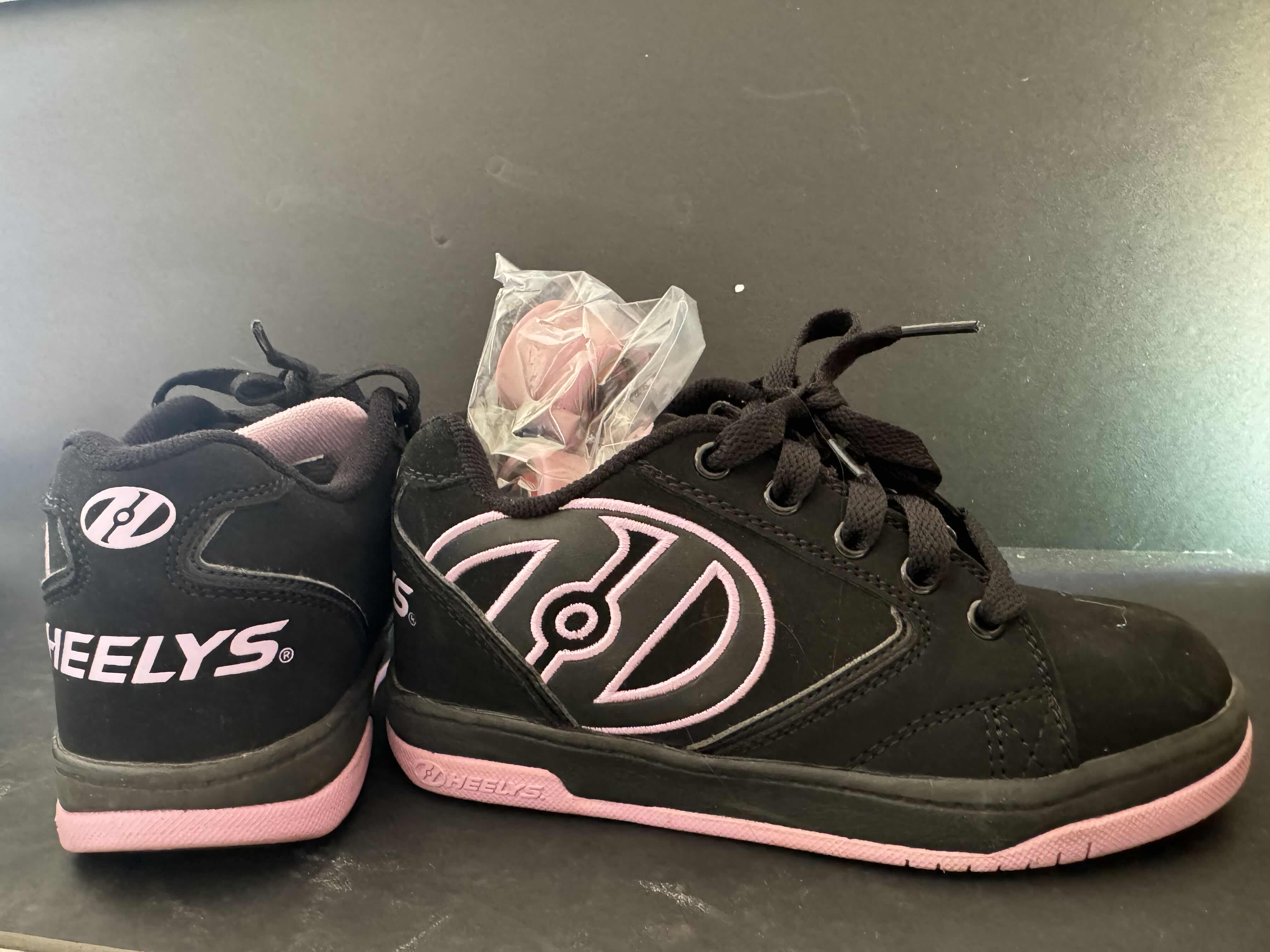 Photo 1 of BRAND NEW HEELYS SIZE YOUTH 1