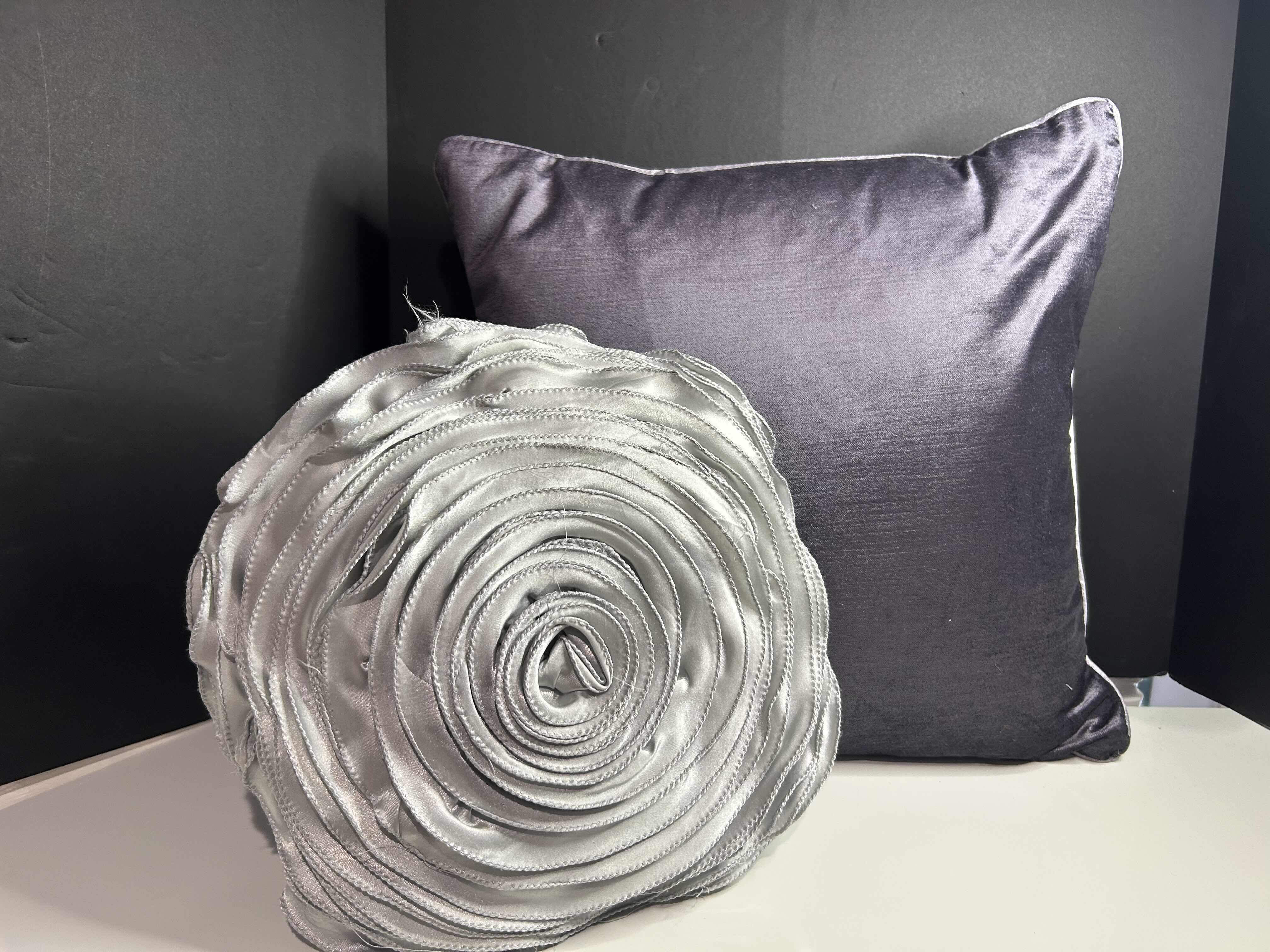 Photo 1 of 2- DECORATIVE THROW PILLOWS IN PURPLE AND SILVER 16” X 16” & 12” DIAMETER
