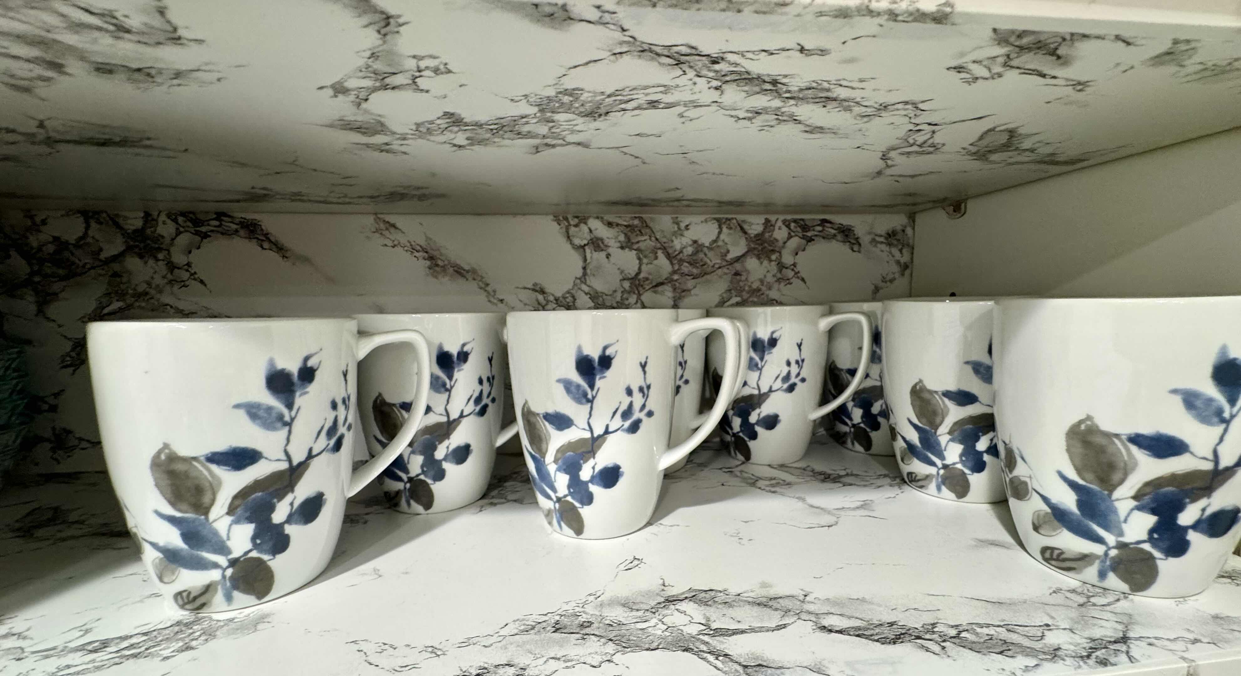 Photo 1 of 8-CONTENTS OF SHELF SET OF BLUE FLORAL COFFEE/TEA CUPS. 