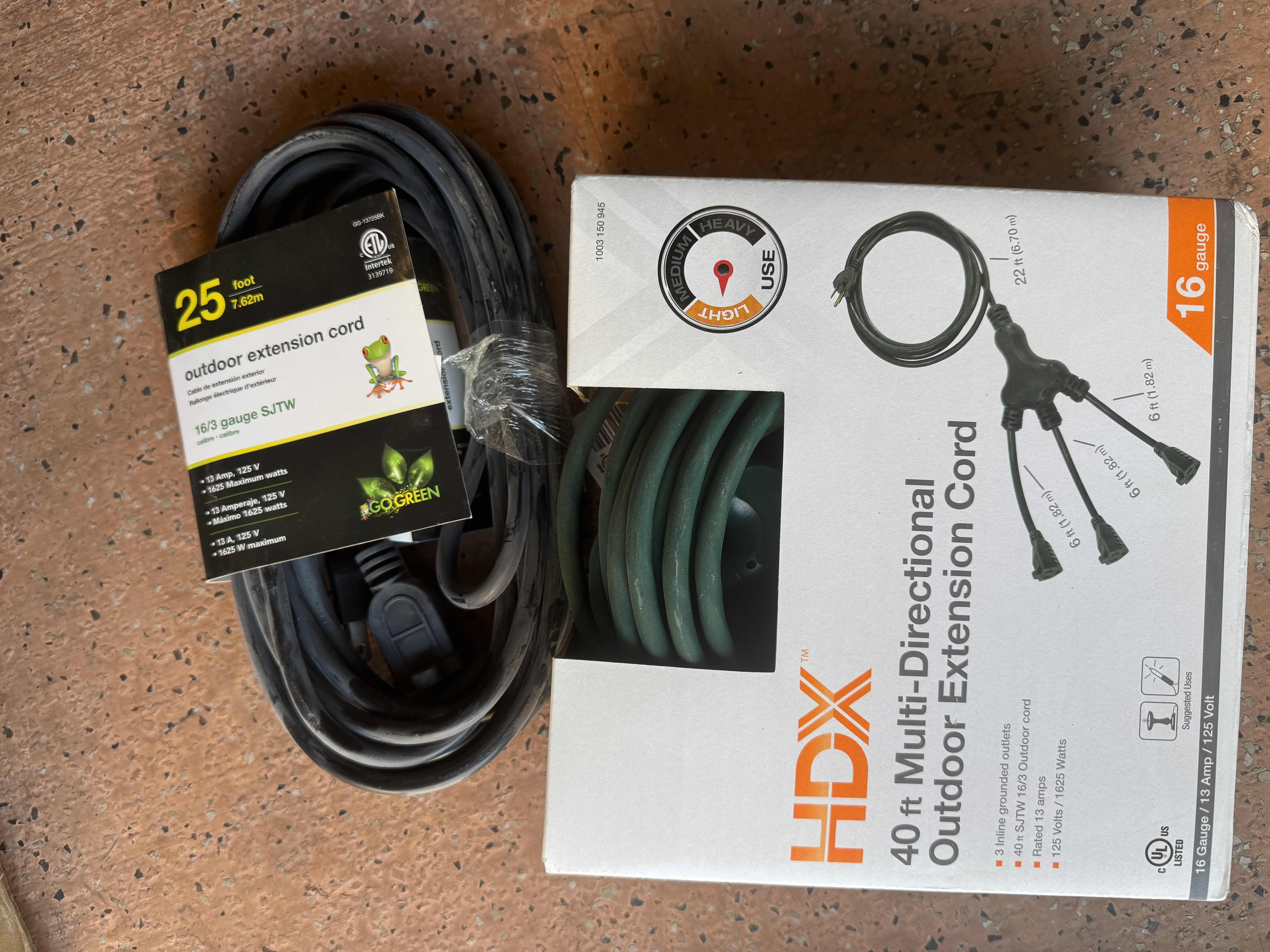 Photo 1 of 2- BRAND NEW EXTENSION CORDS, 1- 40' MULTI-DIRECTIONAL, 1- 25'