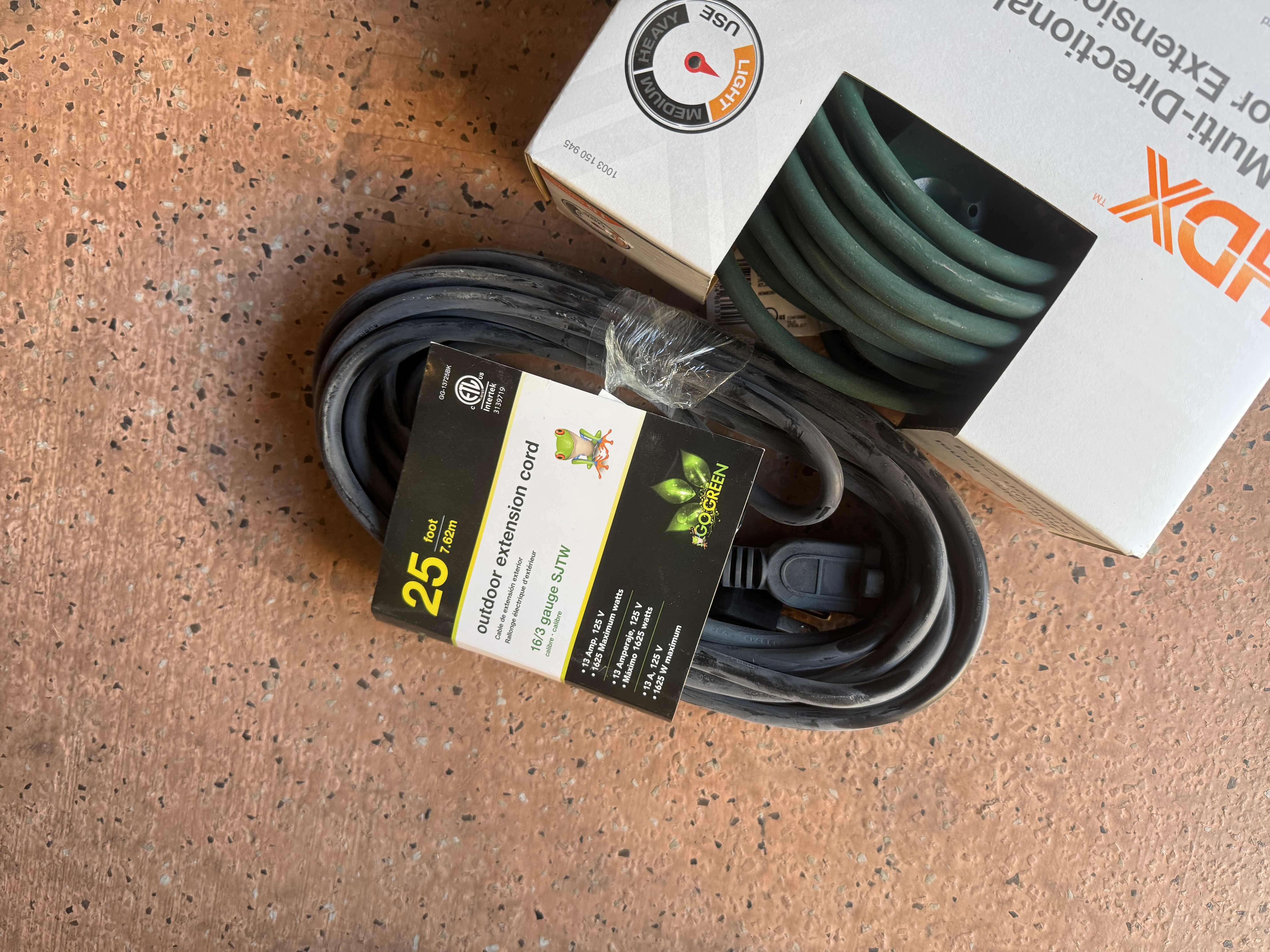 Photo 1 of 2- BRAND NEW EXTENSION CORDS, 1- 40' MULTI-DIRECTIONAL, 1- 25'