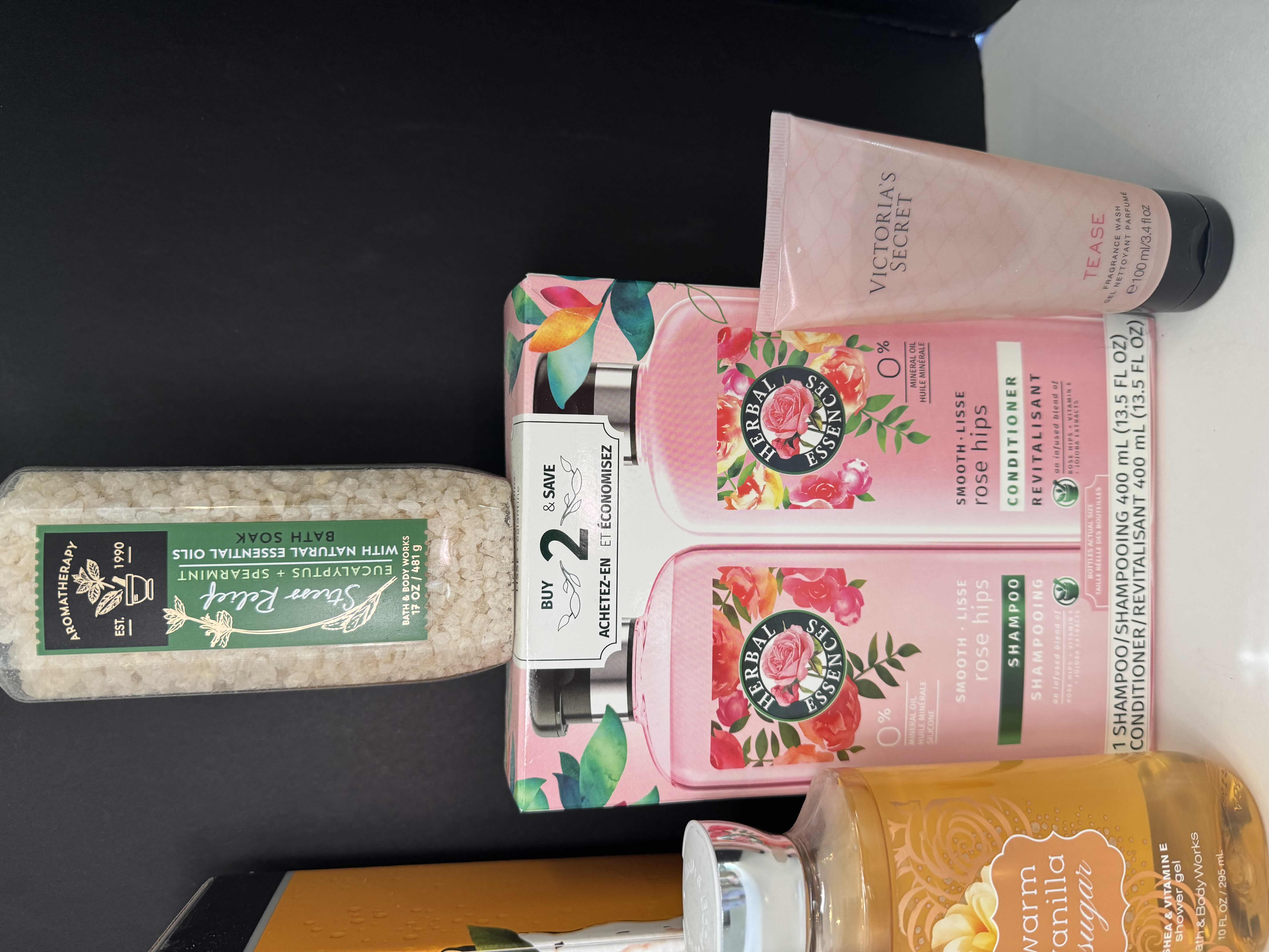 Photo 1 of 6- BATH ESSENTIALS - BATH SOAK, SHAMPOO AND CONDITIONER, SHOWER GEL, AND BODY WASH