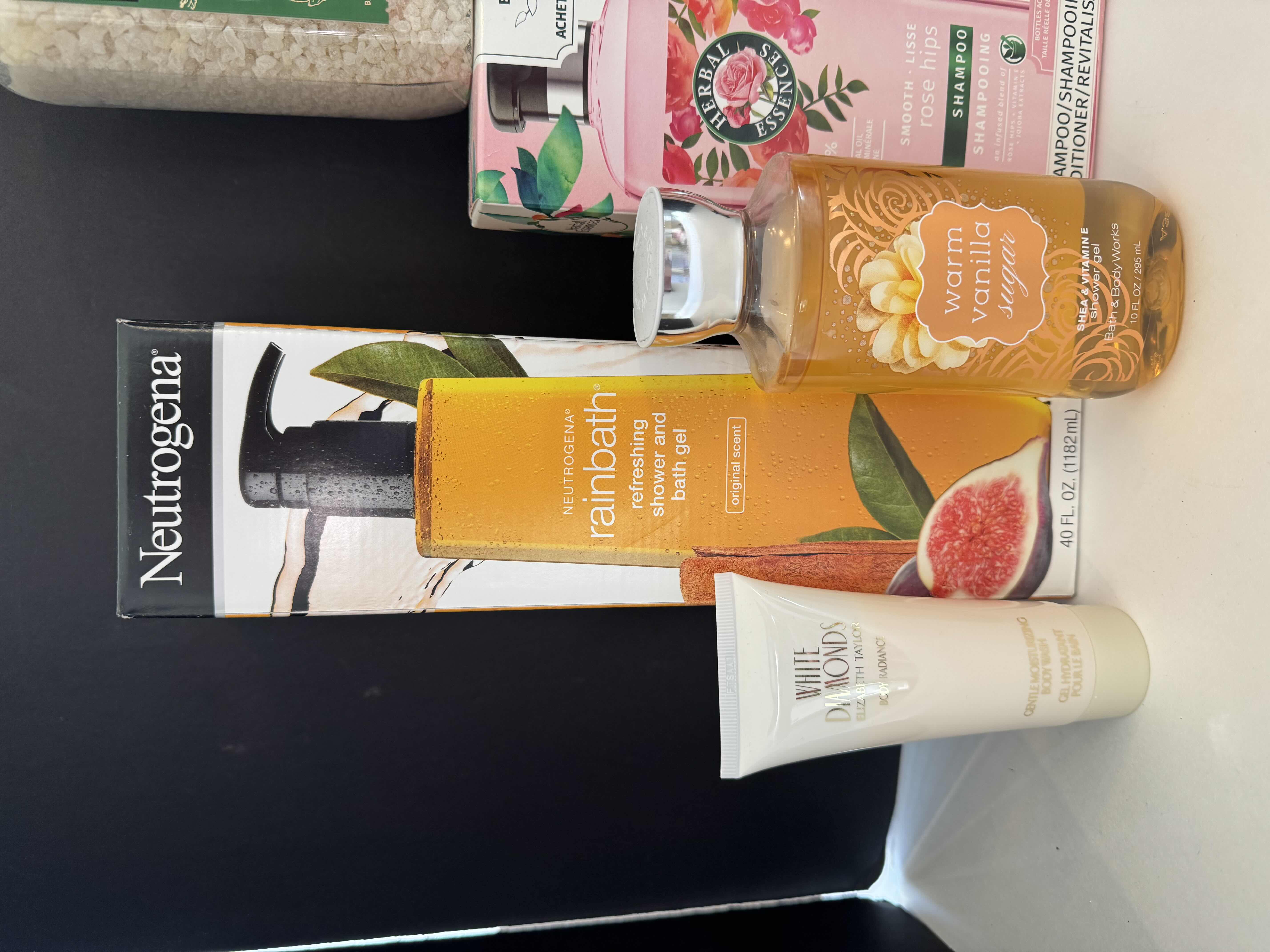 Photo 1 of 6- BATH ESSENTIALS - BATH SOAK, SHAMPOO AND CONDITIONER, SHOWER GEL, AND BODY WASH