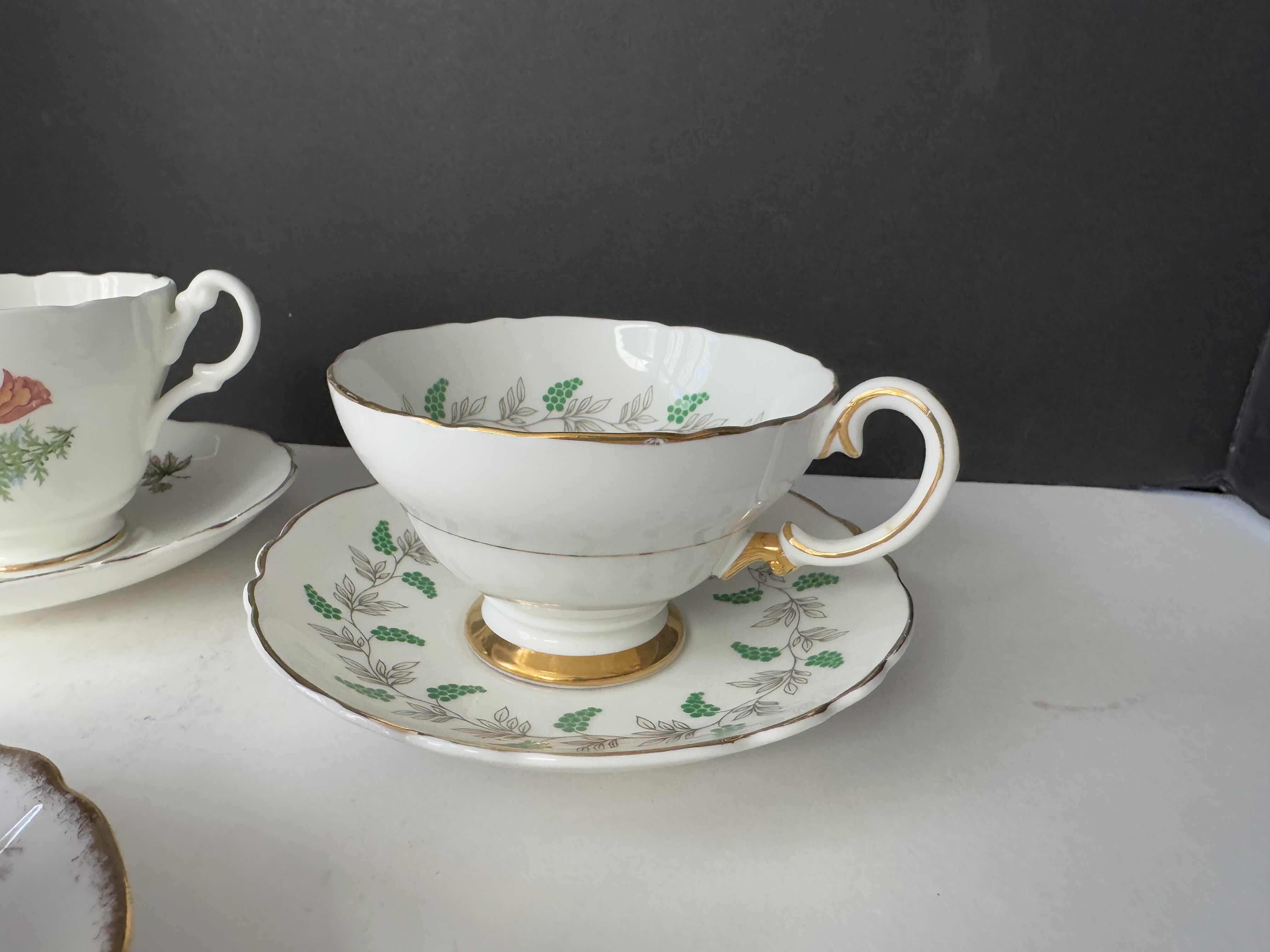Photo 1 of 3 SETS OF SAUCERS WITH TEACUPS