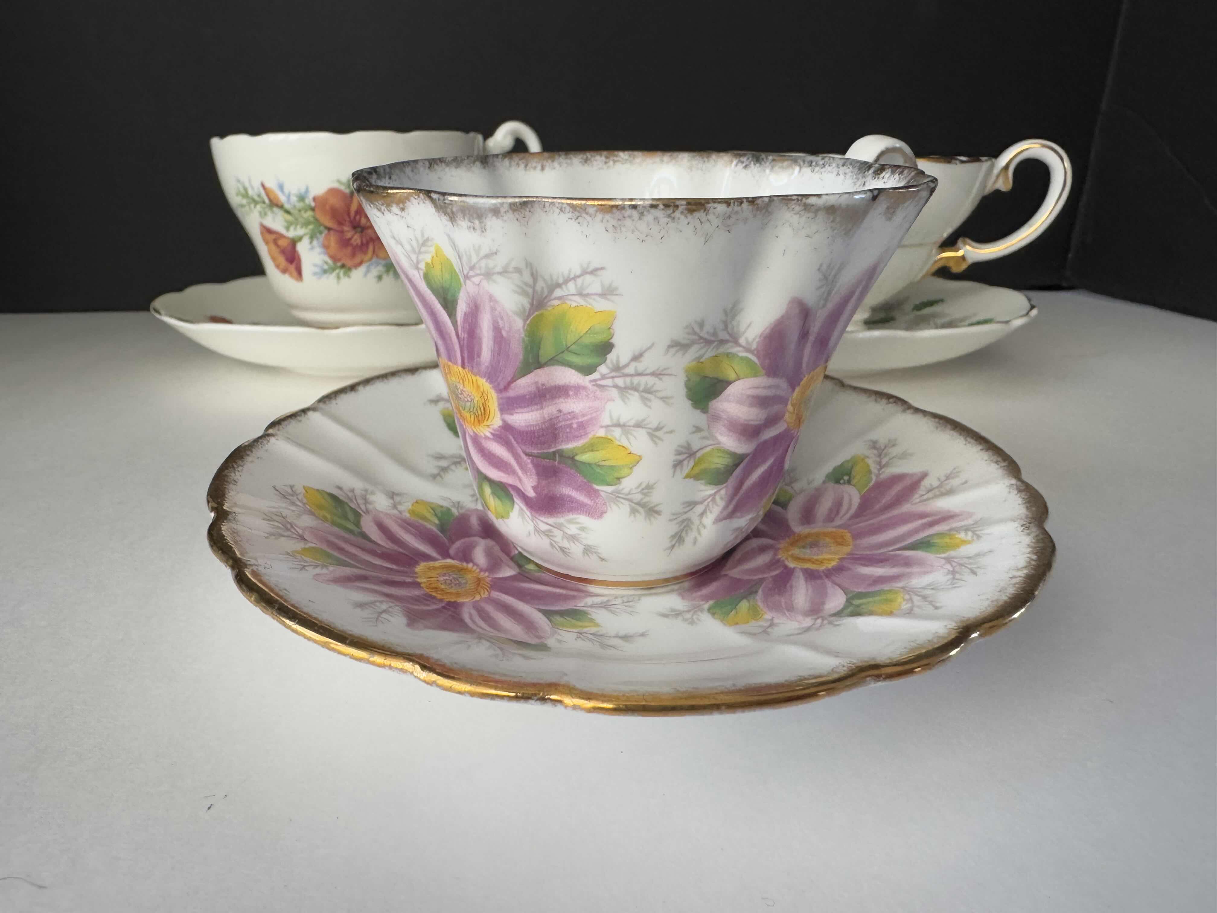 Photo 3 of 3 SETS OF SAUCERS WITH TEACUPS