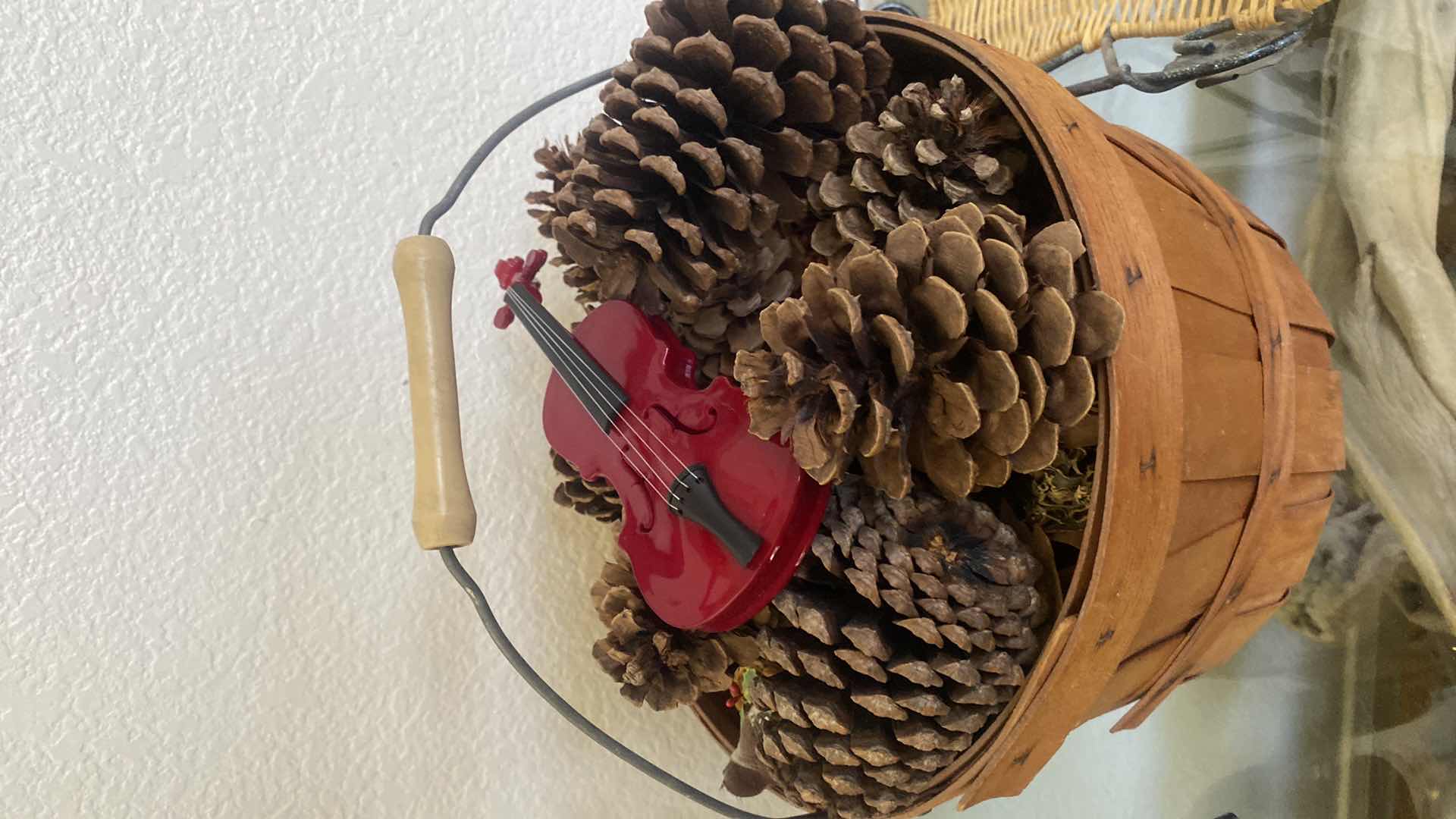 Photo 1 of BASKET OF PINE CONES & DECOR