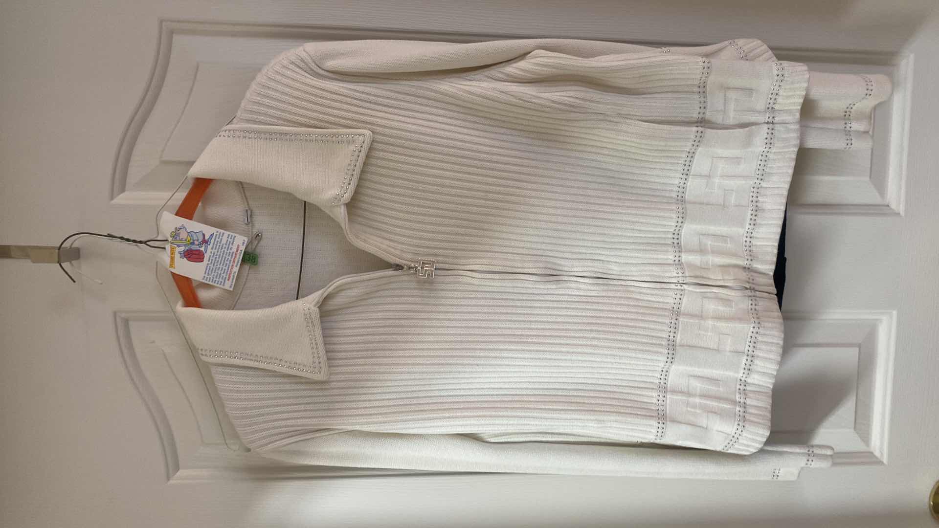 Photo 1 of LADIES SIZE 10 ST JOHN JACKET (TAGS REMOVED) AND SIZE 8 PANTS