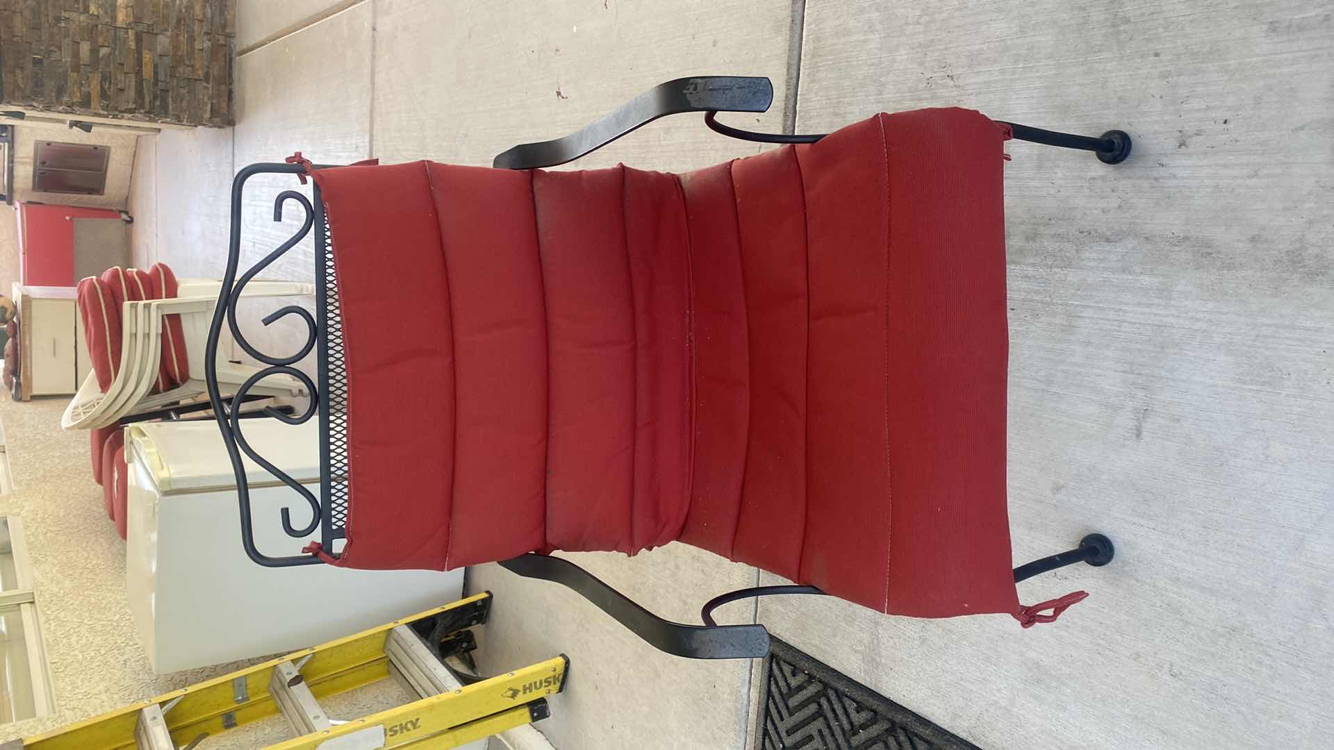 Photo 1 of BLACK MESH METAL 5 PIECE PATIO SET TABLE 44“ x 29 1/2“ & 4 CHAIRS WITH RED CUSHIONS