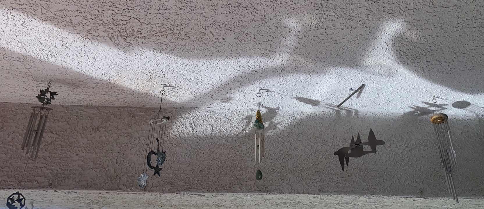 Photo 1 of 5 WIND CHIMES ON STUCCO  PATIO