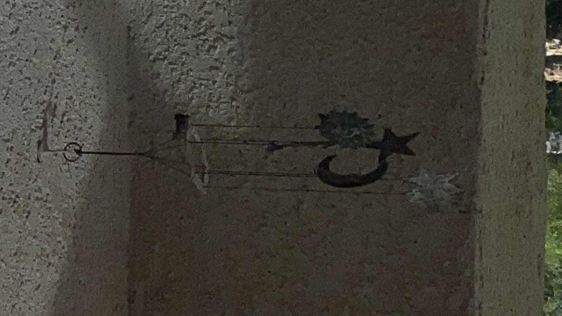 Photo 1 of 5 WIND CHIMES ON STUCCO  PATIO