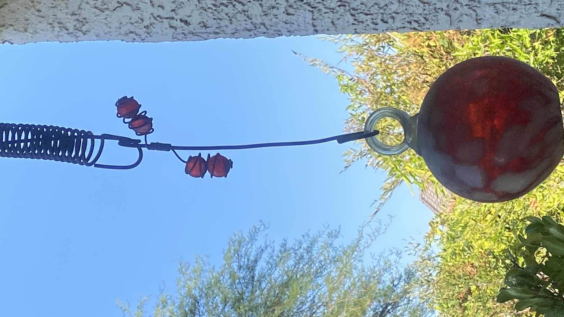 Photo 1 of HANGING ITEMS ON STUCCO PATIO SEE PICTURES