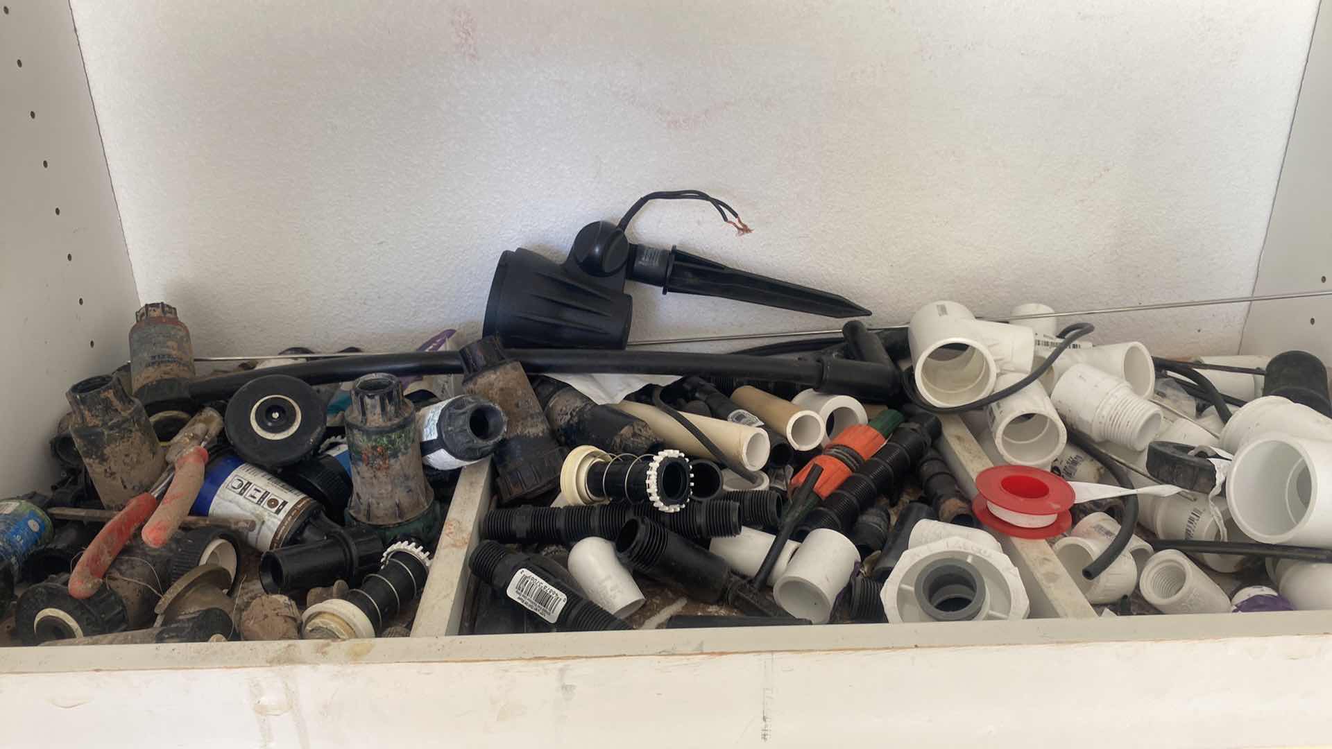 Photo 1 of CONTENTS OF CABINET N SHED PLUMBING AND IRRIGATION SUPPLIES