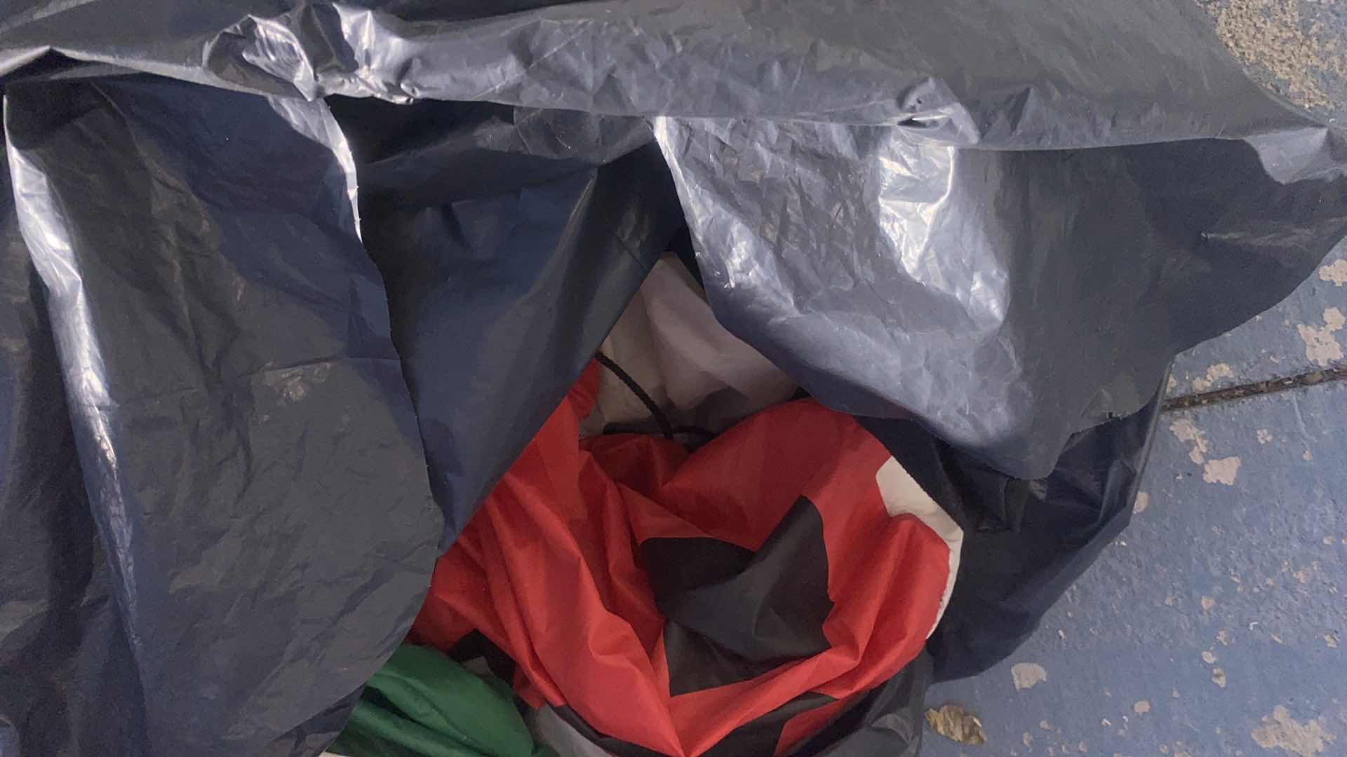 Photo 1 of 2 TOTES WITH CHRISTMAS, SNOWMAN AND BAG WITH INFLATABLE UNKNOWN CONDITION