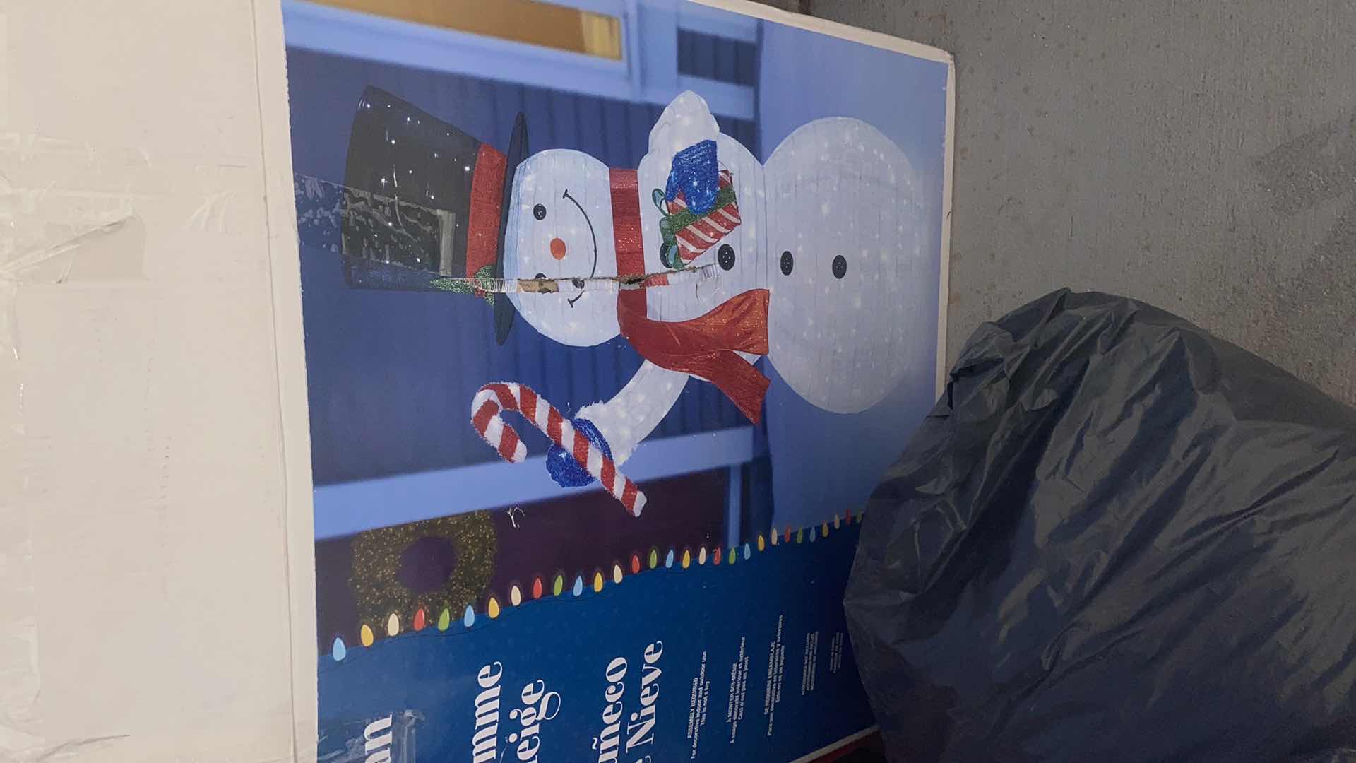 Photo 1 of 2 TOTES WITH CHRISTMAS, SNOWMAN AND BAG WITH INFLATABLE UNKNOWN CONDITION