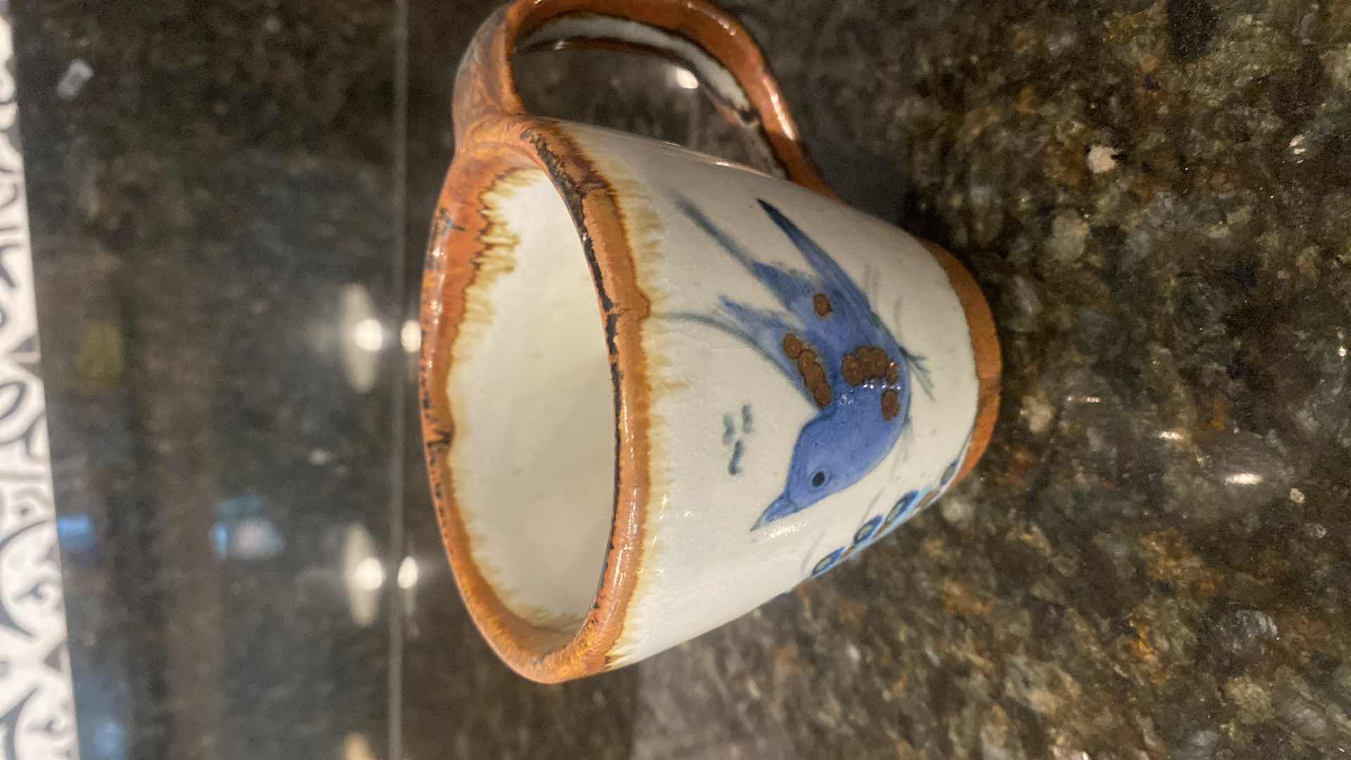 Photo 1 of METAL TEA KETTLE AND CLAY TEA SET