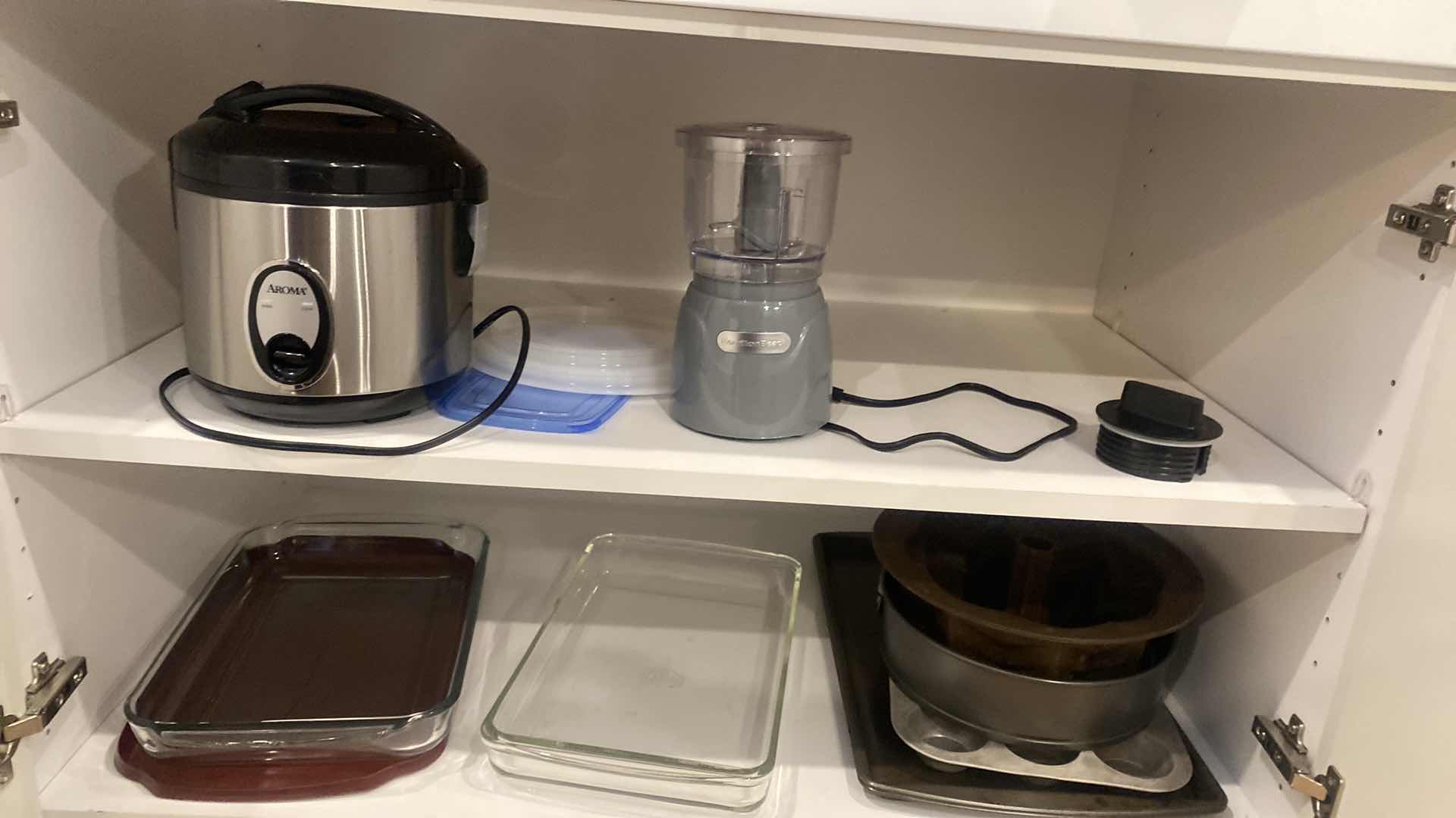 Photo 1 of CONTENTS OF KITCHEN CABINET RICE COOKER BLENDER AND BAKEWARE