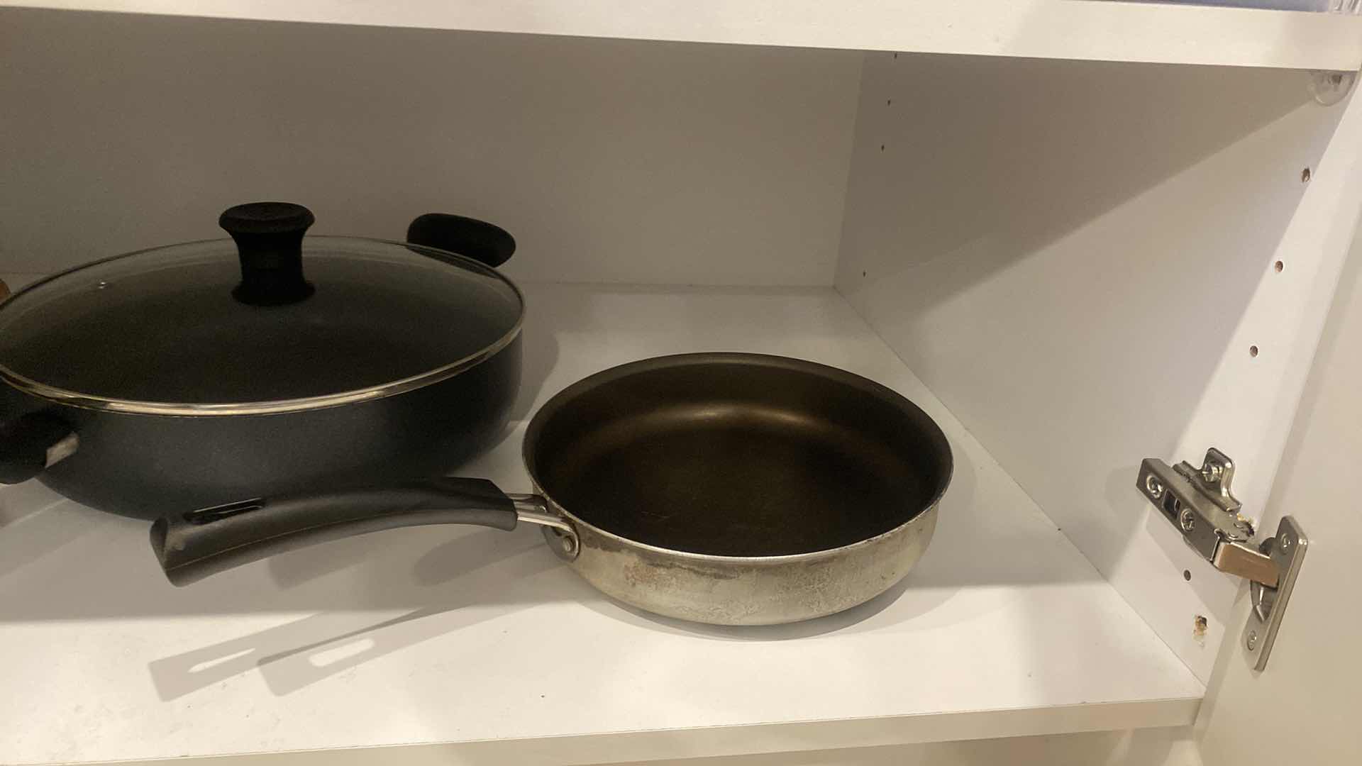 Photo 1 of CONTENTS OF KITCHEN CABINET POTS & PANS