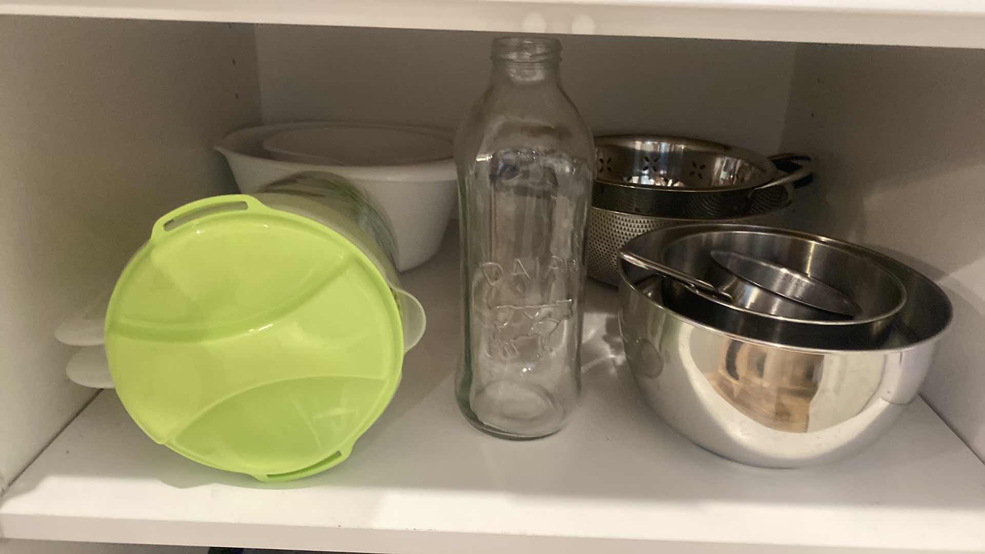 Photo 1 of CONTENTS OF KITCHEN CABINET MIXING BELLA & COLANDERS