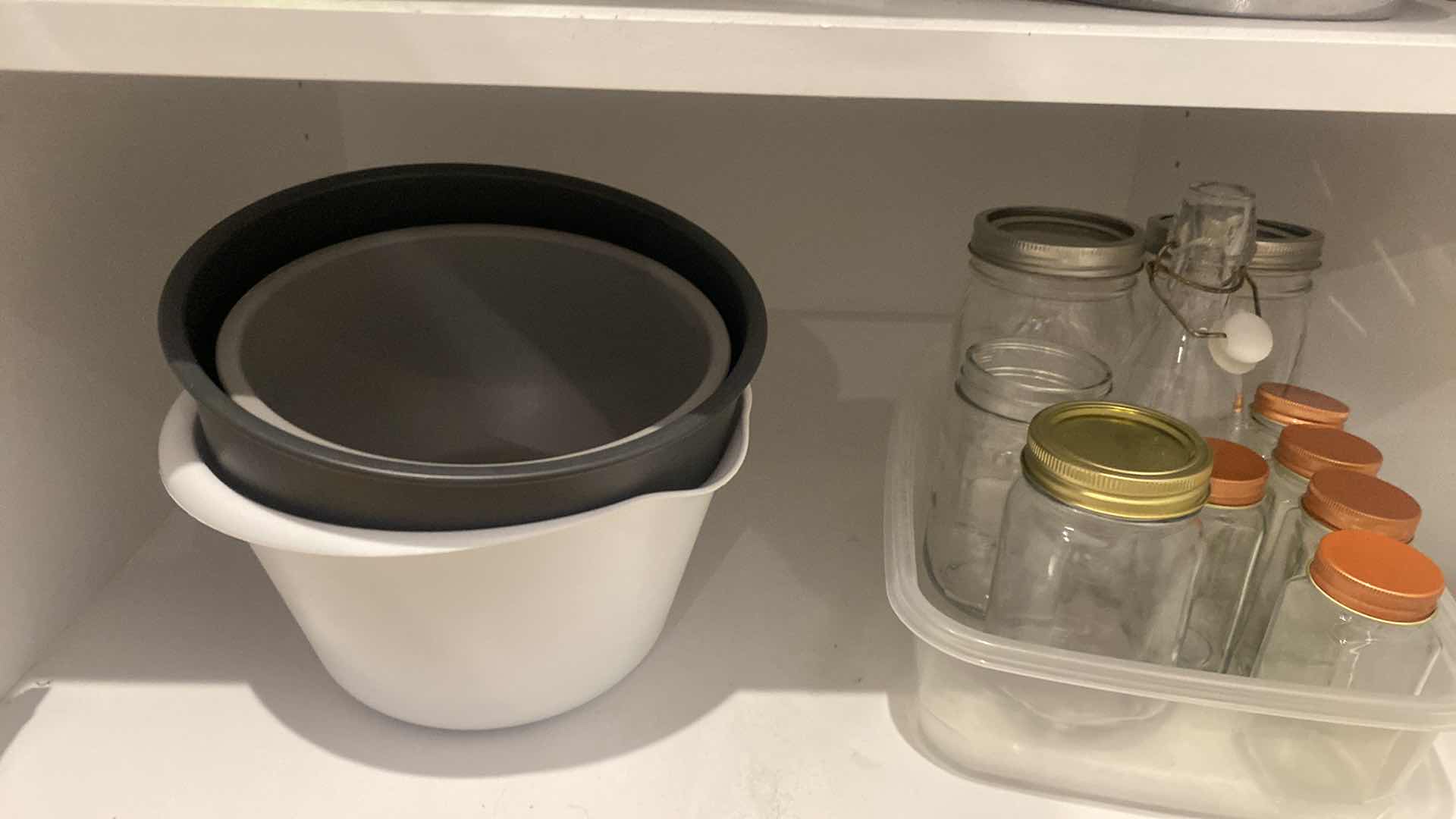 Photo 1 of CONTENTS OF KITCHEN CABINET MIXING BELLA & COLANDERS