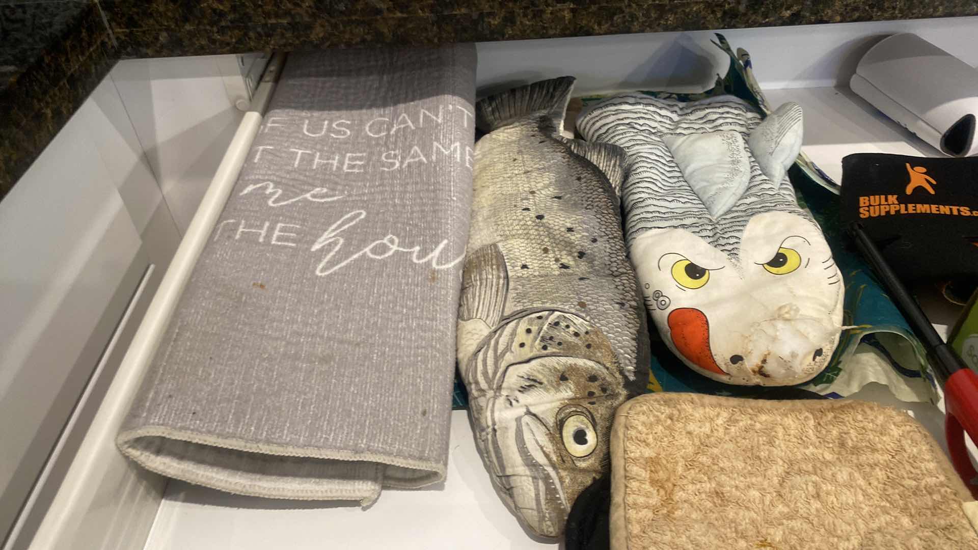 Photo 1 of CONTENTS OF KITCHEN CABINET WRAPPINGS & LINENS