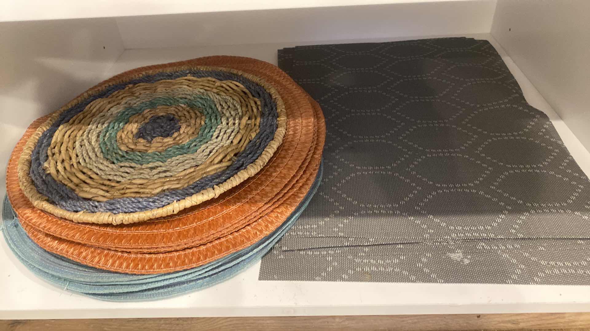 Photo 1 of CONTENTS OF KITCHEN CABINET DOG BOWLS & PLACEMATS