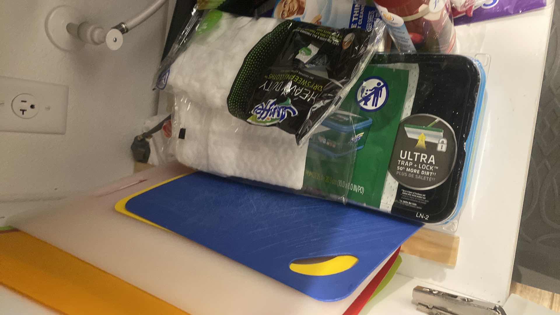 Photo 1 of CONTENTS OF KITCHEN CABINET CLEANING SUPPLIES AND ANTI FATIGUE MAT