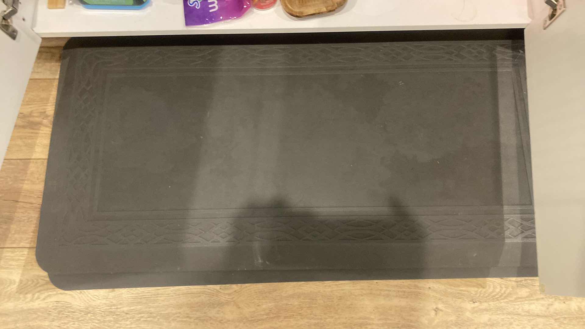 Photo 1 of CONTENTS OF KITCHEN CABINET CLEANING SUPPLIES AND ANTI FATIGUE MAT