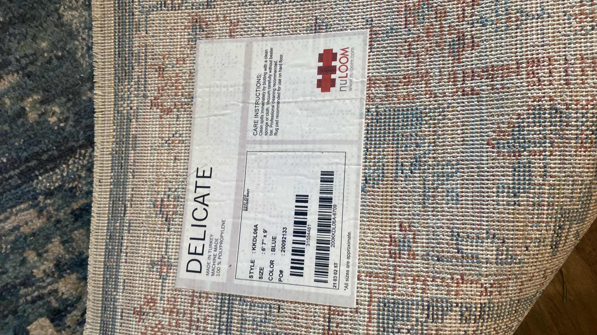 Photo 1 of DELICATE AREA RUG MADE IN TURKEY 6’ 7” X 9’ BLUE CREAMS AND ORANGES