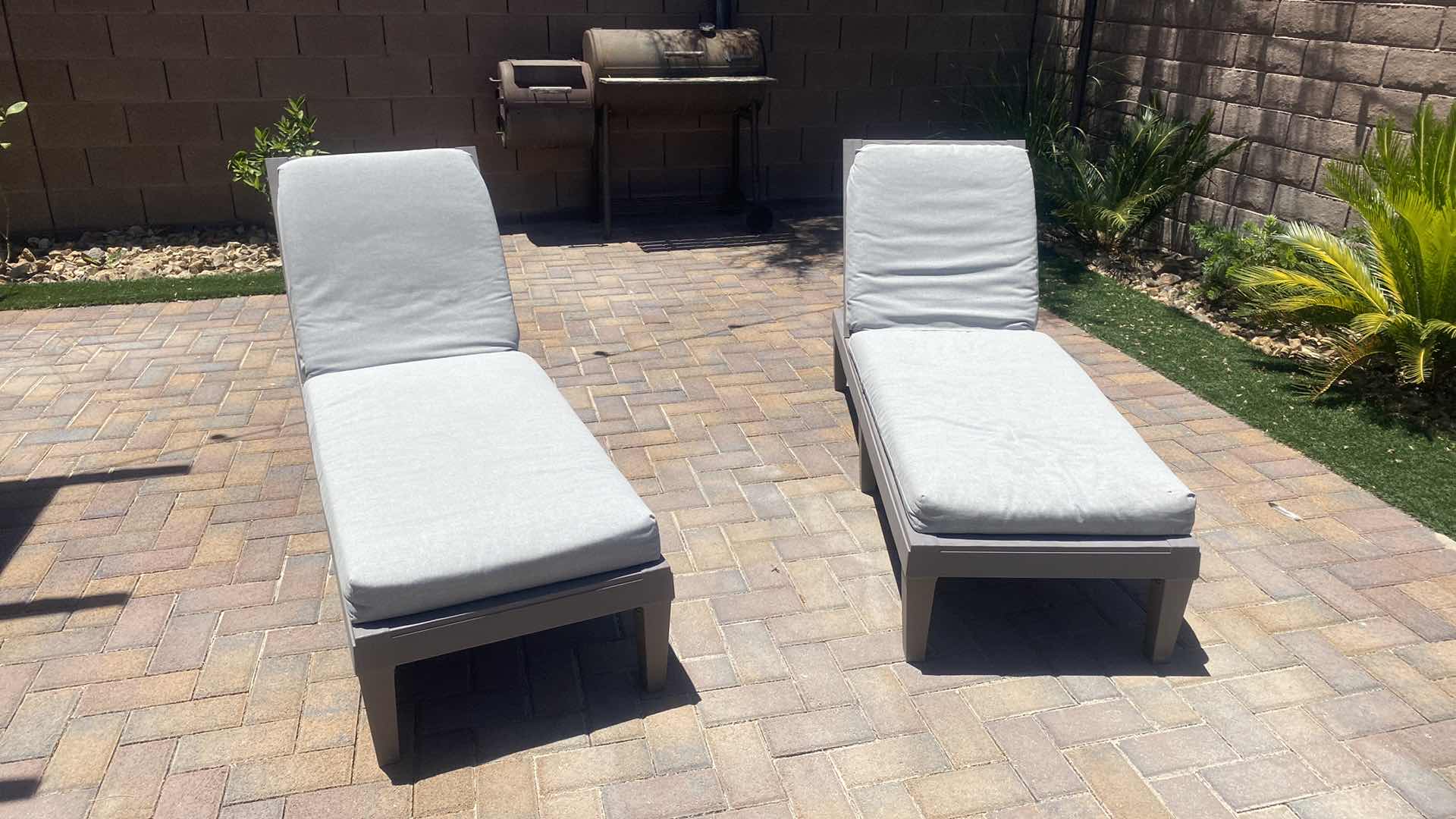 Photo 1 of PAIR OF RESIN CHAISE LOUNGES WITH CUSHIONS