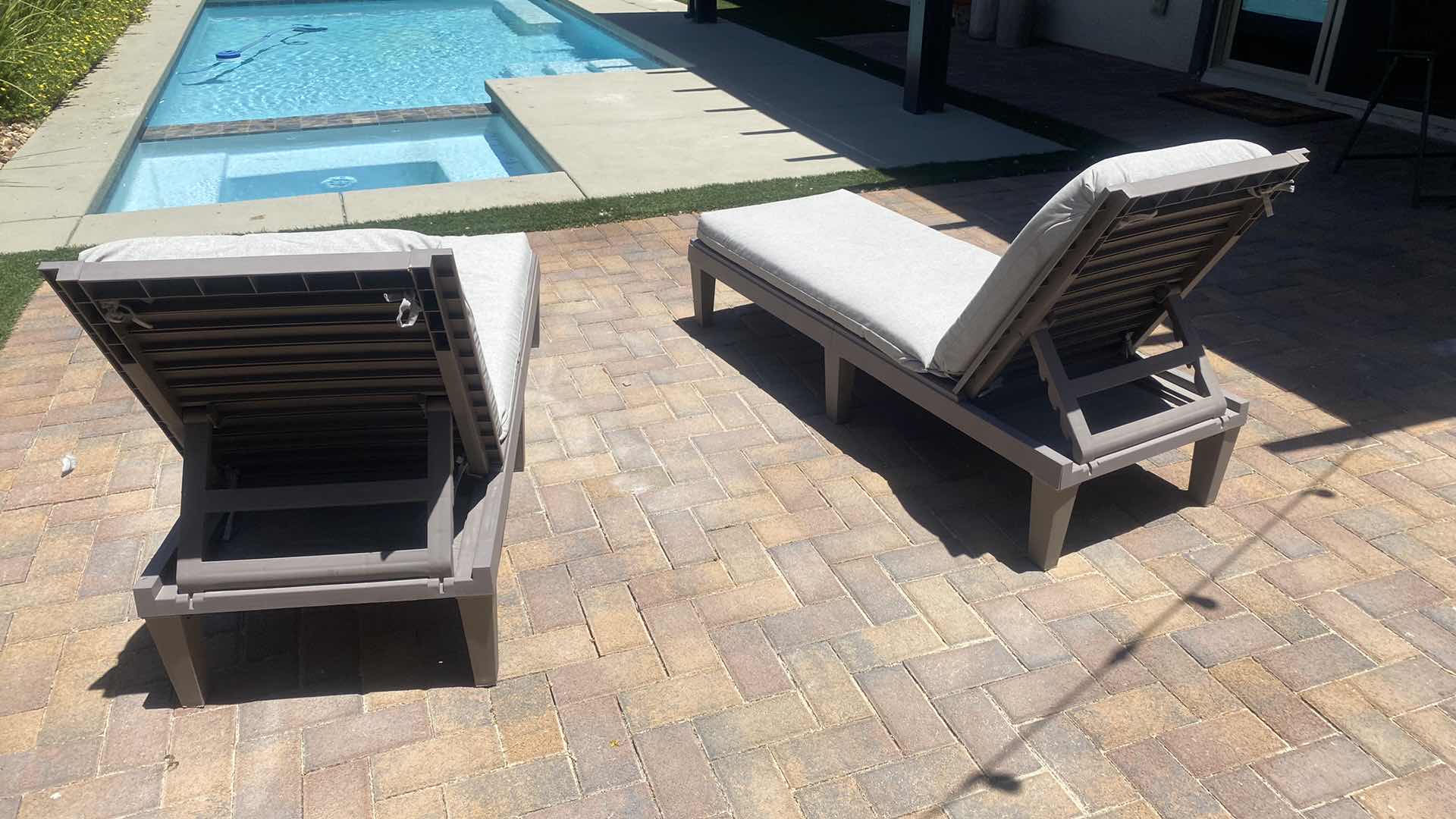 Photo 1 of PAIR OF RESIN CHAISE LOUNGES WITH CUSHIONS