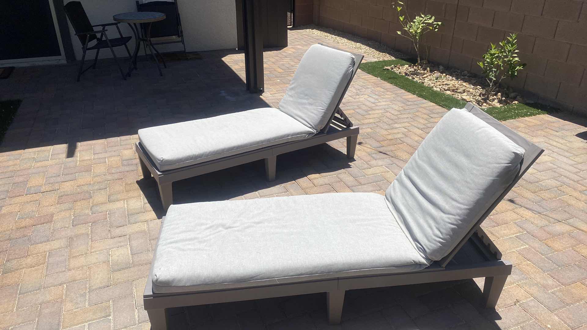 Photo 1 of PAIR OF RESIN CHAISE LOUNGES WITH CUSHIONS