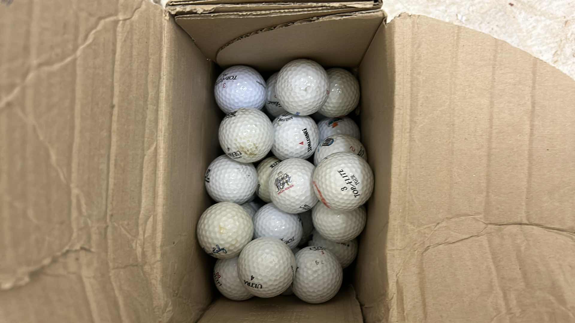 Photo 1 of BOX OF GOLF BALLS