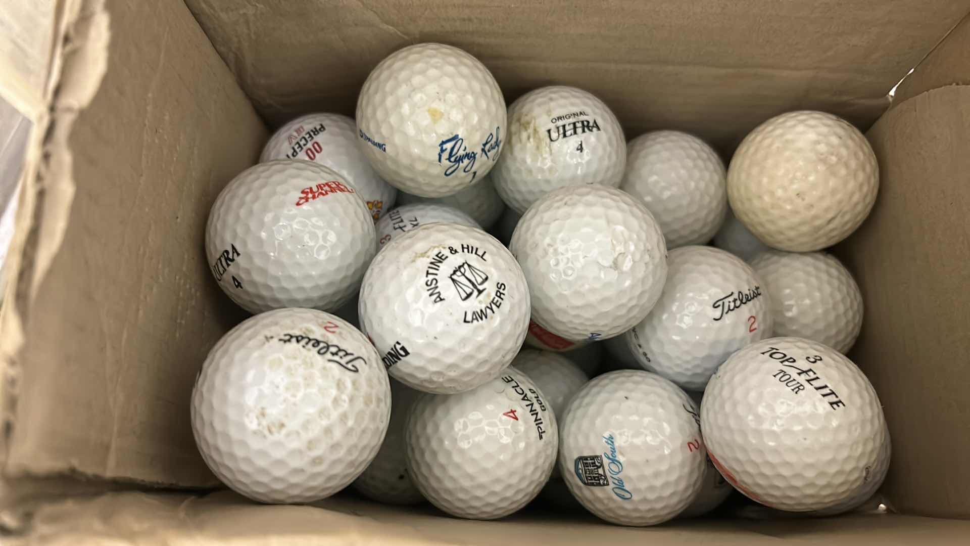 Photo 1 of BOX OF GOLF BALLS