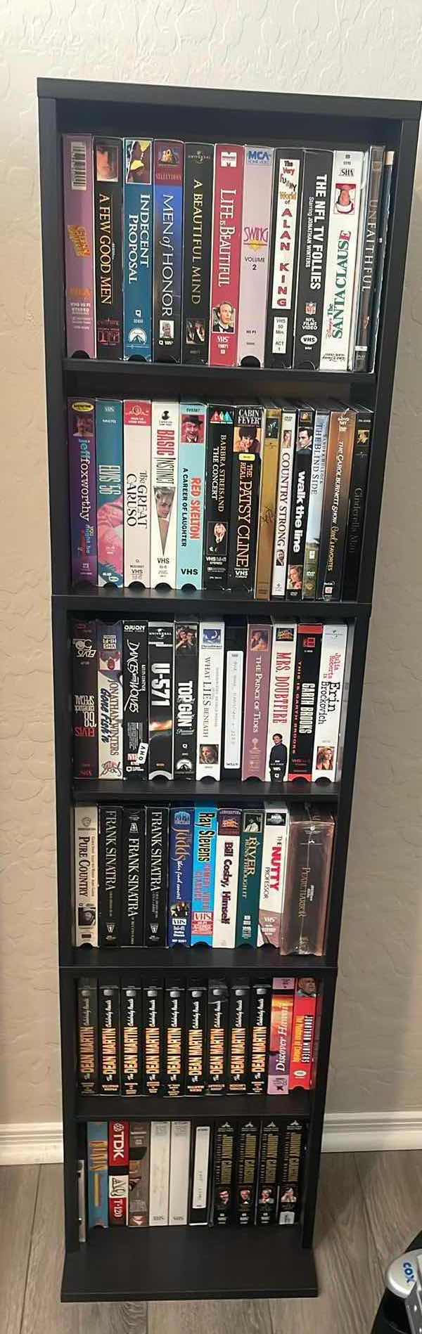 Photo 1 of VHS BOOKCASE AND TAPES 13" X 6" H54"